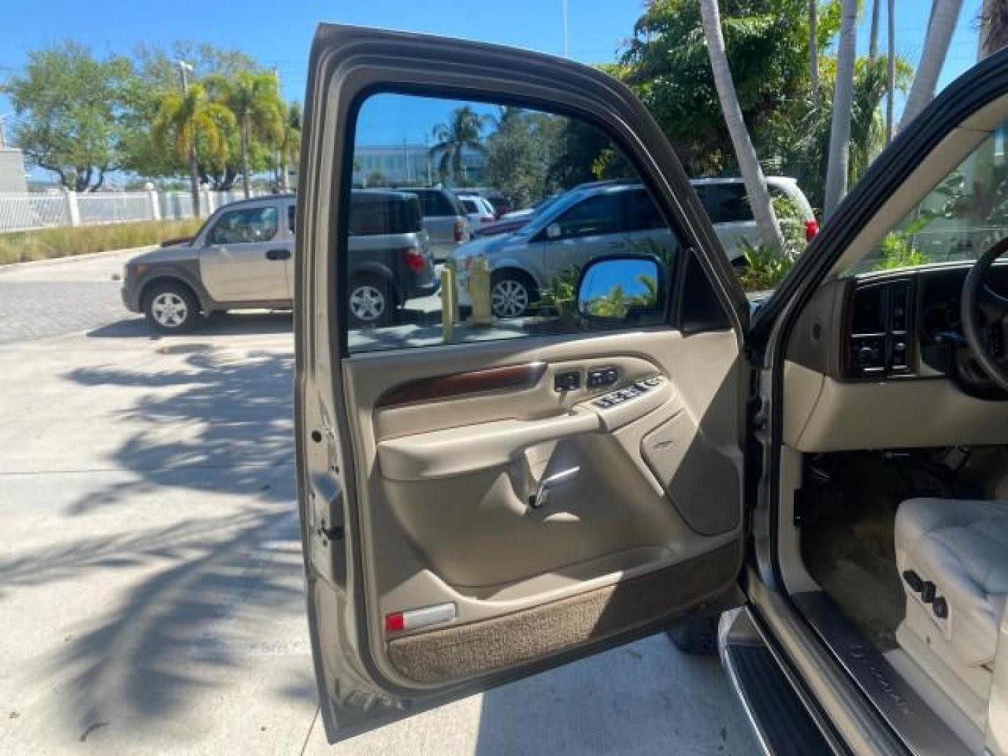 2002 Silver Sand /Shale Cadillac Escalade AWD I OWNER NO ACCIDENTS (1GYEK63N72R) with an 6.0L Vortec 1000 SFI V8 HO Engine engine, Automatic transmission, located at 4701 North Dixie Hwy, Pompano Beach, FL, 33064, (954) 422-2889, 26.240938, -80.123474 - OUR WEBPAGE FLORIDACARS1.COM HAS OVER 100 PHOTOS AND FREE CARFAX LINK 2002 CADILLAC ESCALADE VIN: 1GYEK63N72R215443 1 G Y E K 6 3 N 7 2 R 2 1 5 4 4 3 4 DOOR WAGON/SPORT UTILITY 6.0L V8 F GASOLINE ALL WHEEL DRIVE Top Features Alloy Wheels Running Boards Bed Liner Tow Hitch Cloth Seats Basic Features - Photo#9