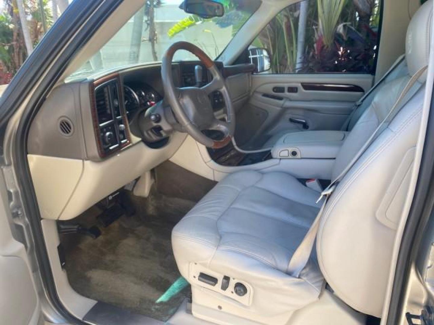 2002 Silver Sand /Shale Cadillac Escalade AWD I OWNER NO ACCIDENTS (1GYEK63N72R) with an 6.0L Vortec 1000 SFI V8 HO Engine engine, Automatic transmission, located at 4701 North Dixie Hwy, Pompano Beach, FL, 33064, (954) 422-2889, 26.240938, -80.123474 - OUR WEBPAGE FLORIDACARS1.COM HAS OVER 100 PHOTOS AND FREE CARFAX LINK 2002 CADILLAC ESCALADE VIN: 1GYEK63N72R215443 1 G Y E K 6 3 N 7 2 R 2 1 5 4 4 3 4 DOOR WAGON/SPORT UTILITY 6.0L V8 F GASOLINE ALL WHEEL DRIVE Top Features Alloy Wheels Running Boards Bed Liner Tow Hitch Cloth Seats Basic Features - Photo#10
