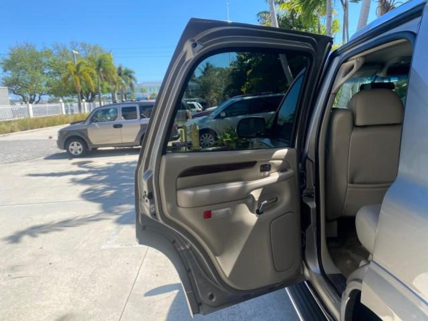2002 Silver Sand /Shale Cadillac Escalade AWD I OWNER NO ACCIDENTS (1GYEK63N72R) with an 6.0L Vortec 1000 SFI V8 HO Engine engine, Automatic transmission, located at 4701 North Dixie Hwy, Pompano Beach, FL, 33064, (954) 422-2889, 26.240938, -80.123474 - OUR WEBPAGE FLORIDACARS1.COM HAS OVER 100 PHOTOS AND FREE CARFAX LINK 2002 CADILLAC ESCALADE VIN: 1GYEK63N72R215443 1 G Y E K 6 3 N 7 2 R 2 1 5 4 4 3 4 DOOR WAGON/SPORT UTILITY 6.0L V8 F GASOLINE ALL WHEEL DRIVE Top Features Alloy Wheels Running Boards Bed Liner Tow Hitch Cloth Seats Basic Features - Photo#13