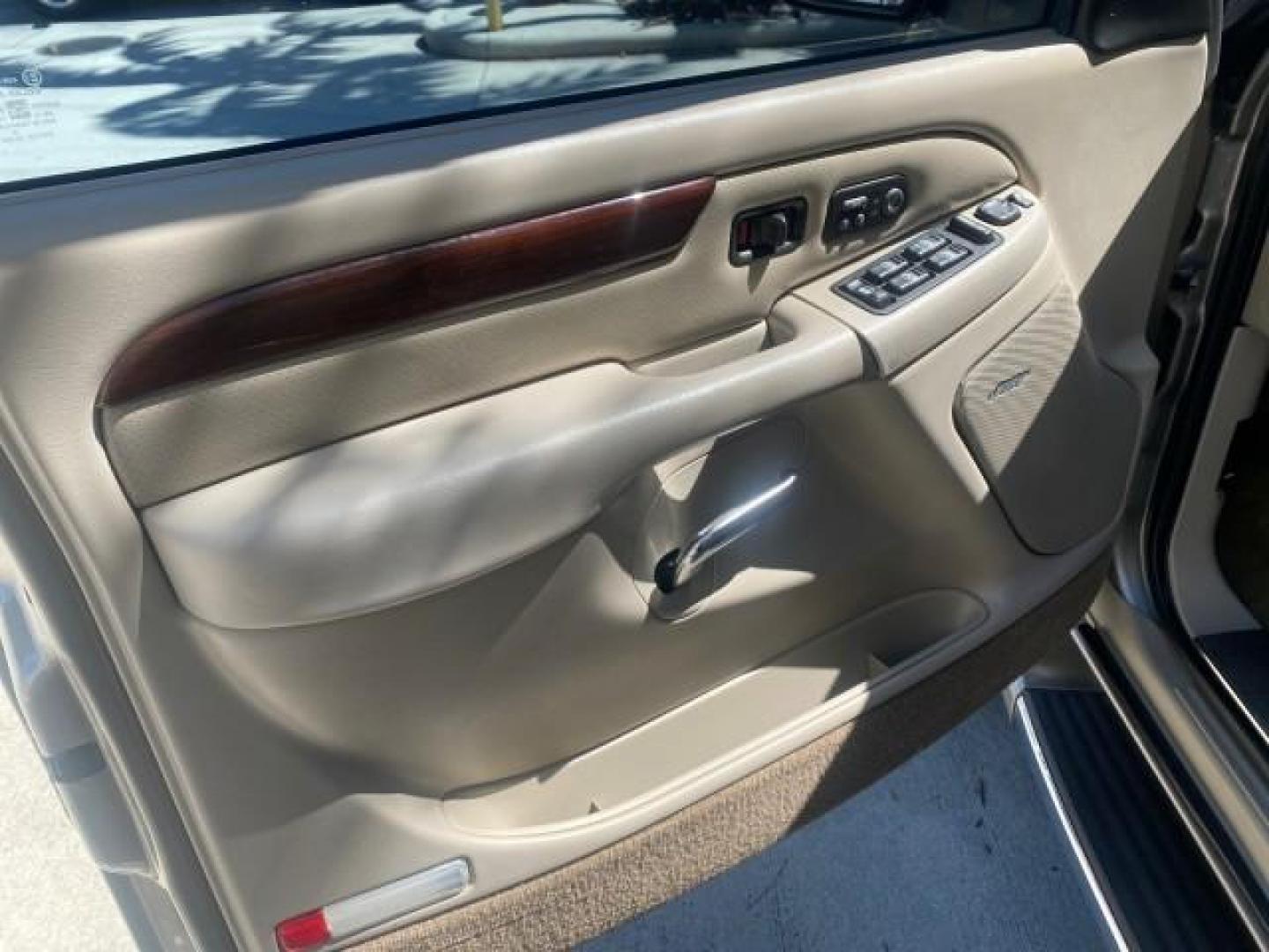 2002 Silver Sand /Shale Cadillac Escalade AWD I OWNER NO ACCIDENTS (1GYEK63N72R) with an 6.0L Vortec 1000 SFI V8 HO Engine engine, Automatic transmission, located at 4701 North Dixie Hwy, Pompano Beach, FL, 33064, (954) 422-2889, 26.240938, -80.123474 - OUR WEBPAGE FLORIDACARS1.COM HAS OVER 100 PHOTOS AND FREE CARFAX LINK 2002 CADILLAC ESCALADE VIN: 1GYEK63N72R215443 1 G Y E K 6 3 N 7 2 R 2 1 5 4 4 3 4 DOOR WAGON/SPORT UTILITY 6.0L V8 F GASOLINE ALL WHEEL DRIVE Top Features Alloy Wheels Running Boards Bed Liner Tow Hitch Cloth Seats Basic Features - Photo#28