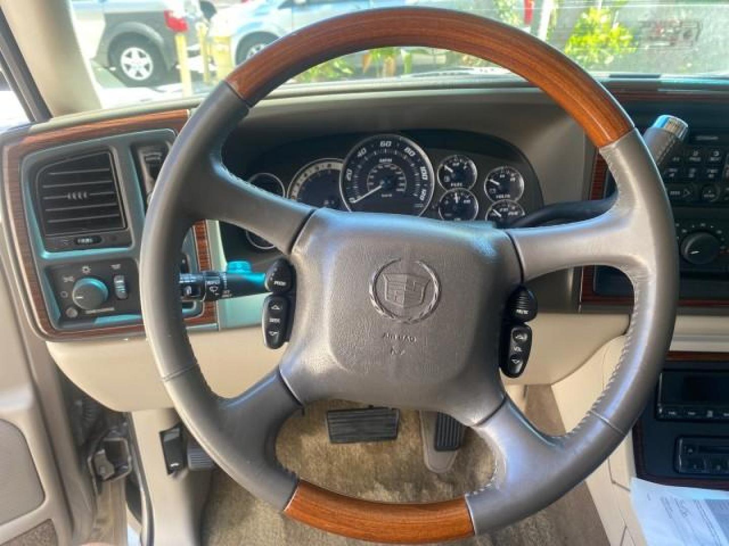 2002 Silver Sand /Shale Cadillac Escalade AWD I OWNER NO ACCIDENTS (1GYEK63N72R) with an 6.0L Vortec 1000 SFI V8 HO Engine engine, Automatic transmission, located at 4701 North Dixie Hwy, Pompano Beach, FL, 33064, (954) 422-2889, 26.240938, -80.123474 - OUR WEBPAGE FLORIDACARS1.COM HAS OVER 100 PHOTOS AND FREE CARFAX LINK 2002 CADILLAC ESCALADE VIN: 1GYEK63N72R215443 1 G Y E K 6 3 N 7 2 R 2 1 5 4 4 3 4 DOOR WAGON/SPORT UTILITY 6.0L V8 F GASOLINE ALL WHEEL DRIVE Top Features Alloy Wheels Running Boards Bed Liner Tow Hitch Cloth Seats Basic Features - Photo#31