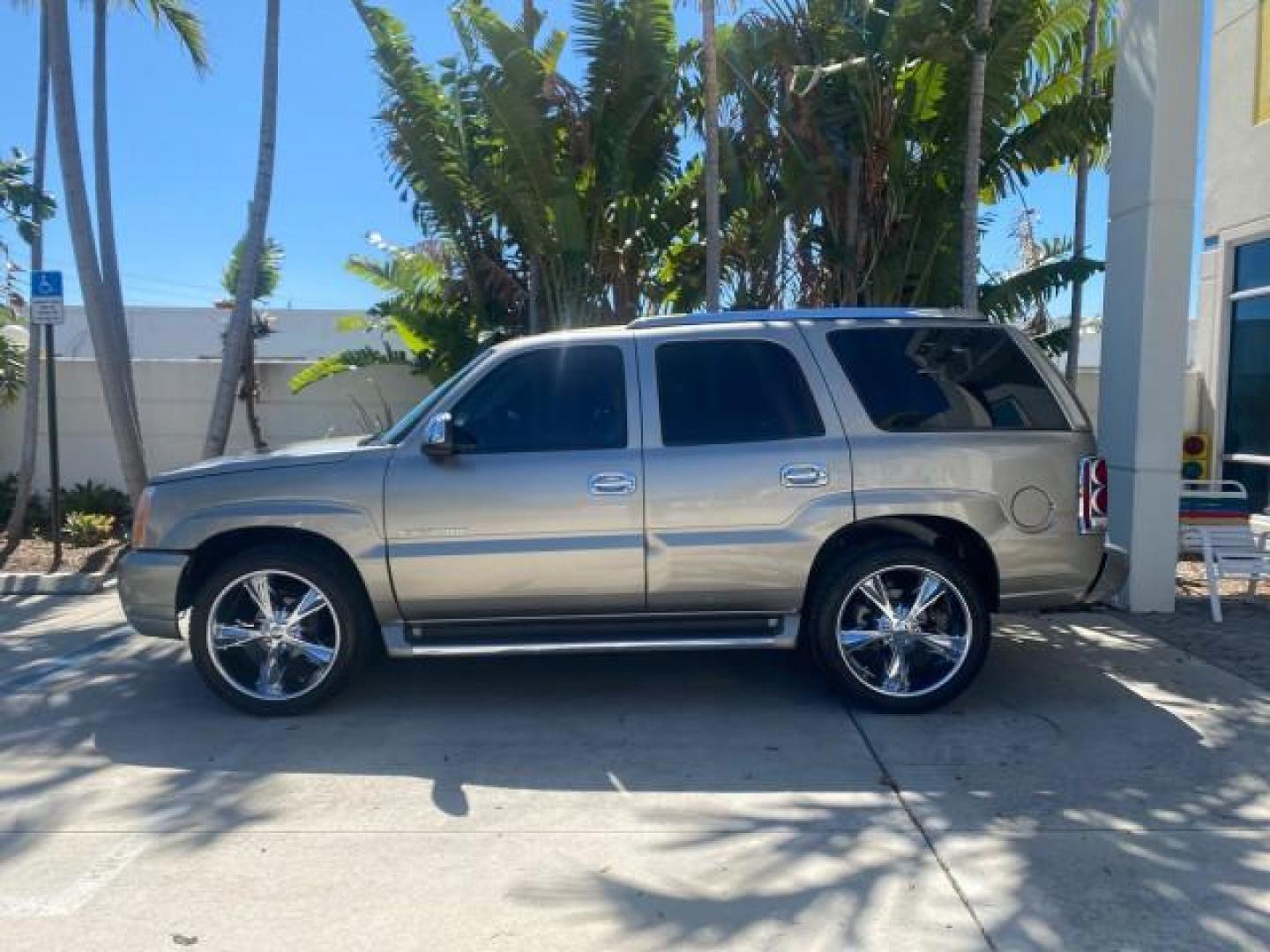 2002 Silver Sand /Shale Cadillac Escalade AWD I OWNER NO ACCIDENTS (1GYEK63N72R) with an 6.0L Vortec 1000 SFI V8 HO Engine engine, Automatic transmission, located at 4701 North Dixie Hwy, Pompano Beach, FL, 33064, (954) 422-2889, 26.240938, -80.123474 - OUR WEBPAGE FLORIDACARS1.COM HAS OVER 100 PHOTOS AND FREE CARFAX LINK 2002 CADILLAC ESCALADE VIN: 1GYEK63N72R215443 1 G Y E K 6 3 N 7 2 R 2 1 5 4 4 3 4 DOOR WAGON/SPORT UTILITY 6.0L V8 F GASOLINE ALL WHEEL DRIVE Top Features Alloy Wheels Running Boards Bed Liner Tow Hitch Cloth Seats Basic Features - Photo#4