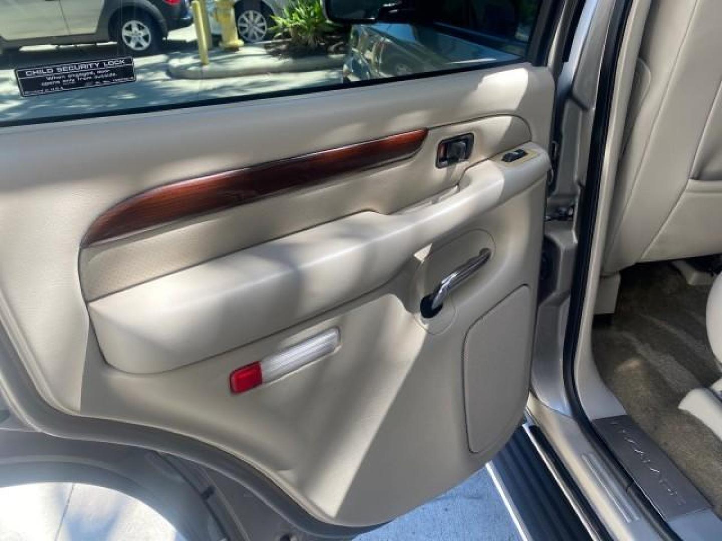 2002 Silver Sand /Shale Cadillac Escalade AWD I OWNER NO ACCIDENTS (1GYEK63N72R) with an 6.0L Vortec 1000 SFI V8 HO Engine engine, Automatic transmission, located at 4701 North Dixie Hwy, Pompano Beach, FL, 33064, (954) 422-2889, 26.240938, -80.123474 - OUR WEBPAGE FLORIDACARS1.COM HAS OVER 100 PHOTOS AND FREE CARFAX LINK 2002 CADILLAC ESCALADE VIN: 1GYEK63N72R215443 1 G Y E K 6 3 N 7 2 R 2 1 5 4 4 3 4 DOOR WAGON/SPORT UTILITY 6.0L V8 F GASOLINE ALL WHEEL DRIVE Top Features Alloy Wheels Running Boards Bed Liner Tow Hitch Cloth Seats Basic Features - Photo#57