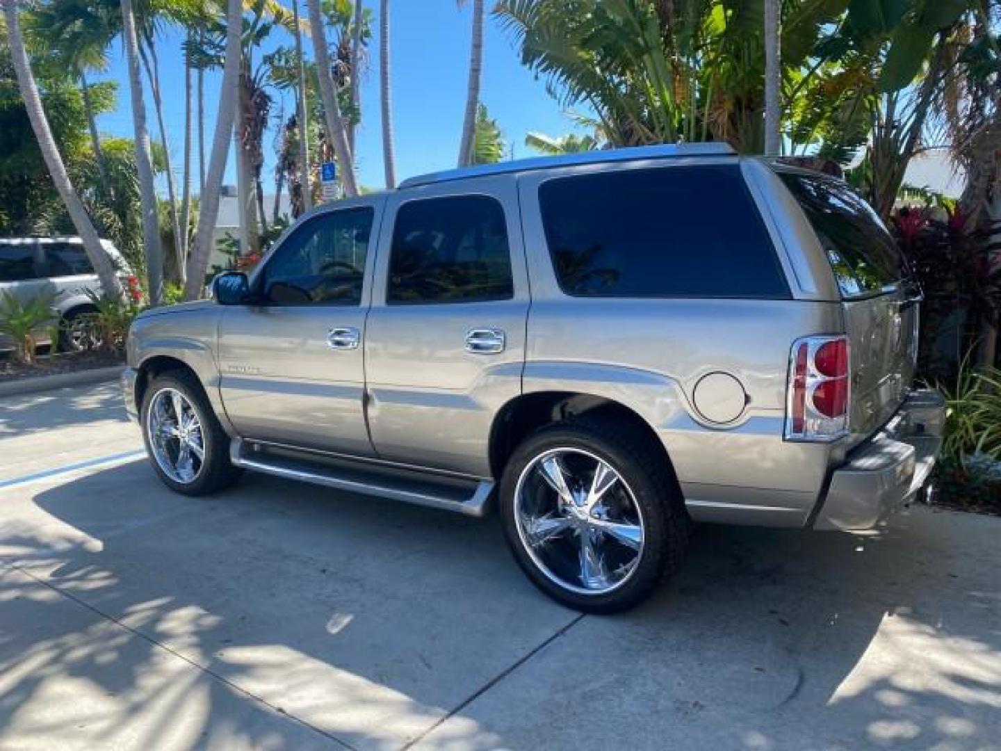 2002 Silver Sand /Shale Cadillac Escalade AWD I OWNER NO ACCIDENTS (1GYEK63N72R) with an 6.0L Vortec 1000 SFI V8 HO Engine engine, Automatic transmission, located at 4701 North Dixie Hwy, Pompano Beach, FL, 33064, (954) 422-2889, 26.240938, -80.123474 - OUR WEBPAGE FLORIDACARS1.COM HAS OVER 100 PHOTOS AND FREE CARFAX LINK 2002 CADILLAC ESCALADE VIN: 1GYEK63N72R215443 1 G Y E K 6 3 N 7 2 R 2 1 5 4 4 3 4 DOOR WAGON/SPORT UTILITY 6.0L V8 F GASOLINE ALL WHEEL DRIVE Top Features Alloy Wheels Running Boards Bed Liner Tow Hitch Cloth Seats Basic Features - Photo#5