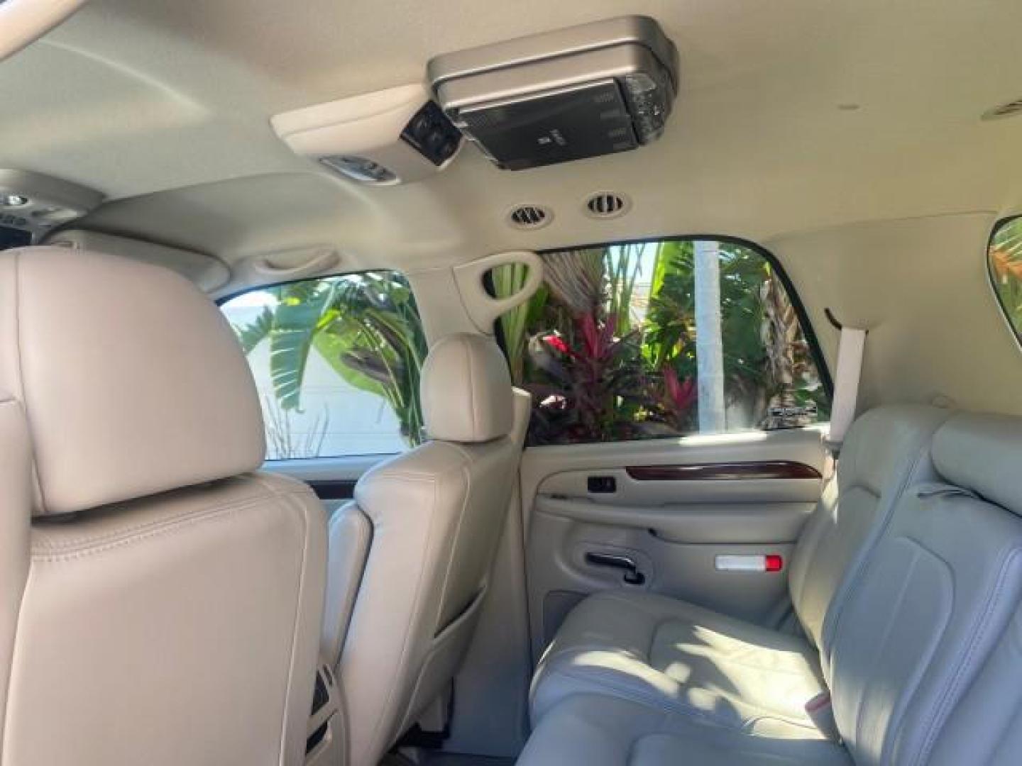 2002 Silver Sand /Shale Cadillac Escalade AWD I OWNER NO ACCIDENTS (1GYEK63N72R) with an 6.0L Vortec 1000 SFI V8 HO Engine engine, Automatic transmission, located at 4701 North Dixie Hwy, Pompano Beach, FL, 33064, (954) 422-2889, 26.240938, -80.123474 - OUR WEBPAGE FLORIDACARS1.COM HAS OVER 100 PHOTOS AND FREE CARFAX LINK 2002 CADILLAC ESCALADE VIN: 1GYEK63N72R215443 1 G Y E K 6 3 N 7 2 R 2 1 5 4 4 3 4 DOOR WAGON/SPORT UTILITY 6.0L V8 F GASOLINE ALL WHEEL DRIVE Top Features Alloy Wheels Running Boards Bed Liner Tow Hitch Cloth Seats Basic Features - Photo#59