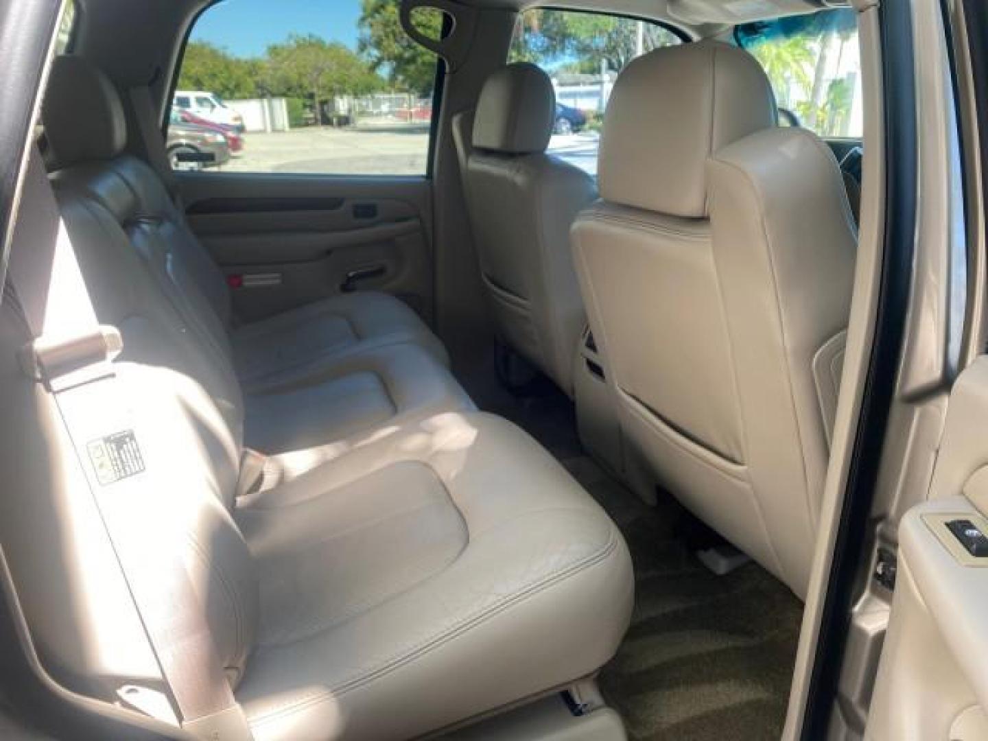 2002 Silver Sand /Shale Cadillac Escalade AWD I OWNER NO ACCIDENTS (1GYEK63N72R) with an 6.0L Vortec 1000 SFI V8 HO Engine engine, Automatic transmission, located at 4701 North Dixie Hwy, Pompano Beach, FL, 33064, (954) 422-2889, 26.240938, -80.123474 - OUR WEBPAGE FLORIDACARS1.COM HAS OVER 100 PHOTOS AND FREE CARFAX LINK 2002 CADILLAC ESCALADE VIN: 1GYEK63N72R215443 1 G Y E K 6 3 N 7 2 R 2 1 5 4 4 3 4 DOOR WAGON/SPORT UTILITY 6.0L V8 F GASOLINE ALL WHEEL DRIVE Top Features Alloy Wheels Running Boards Bed Liner Tow Hitch Cloth Seats Basic Features - Photo#60