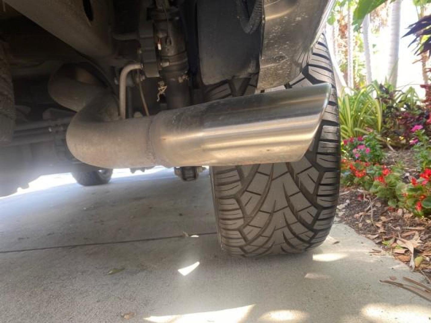 2002 Silver Sand /Shale Cadillac Escalade AWD I OWNER NO ACCIDENTS (1GYEK63N72R) with an 6.0L Vortec 1000 SFI V8 HO Engine engine, Automatic transmission, located at 4701 North Dixie Hwy, Pompano Beach, FL, 33064, (954) 422-2889, 26.240938, -80.123474 - OUR WEBPAGE FLORIDACARS1.COM HAS OVER 100 PHOTOS AND FREE CARFAX LINK 2002 CADILLAC ESCALADE VIN: 1GYEK63N72R215443 1 G Y E K 6 3 N 7 2 R 2 1 5 4 4 3 4 DOOR WAGON/SPORT UTILITY 6.0L V8 F GASOLINE ALL WHEEL DRIVE Top Features Alloy Wheels Running Boards Bed Liner Tow Hitch Cloth Seats Basic Features - Photo#78