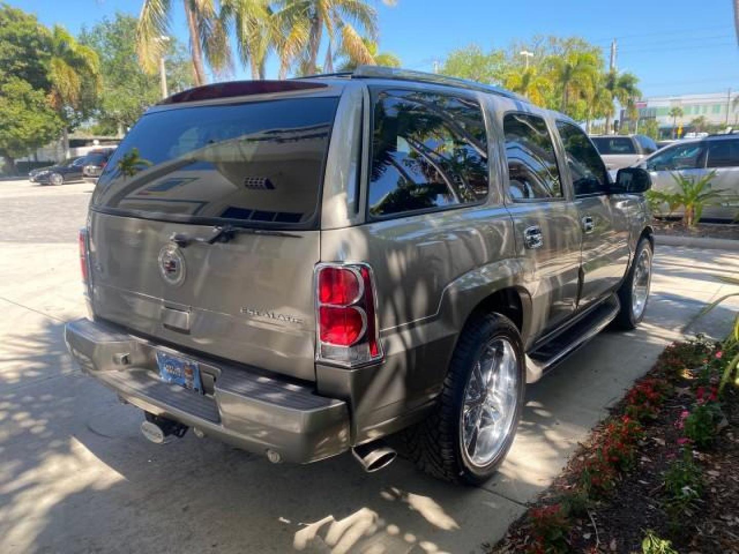 2002 Silver Sand /Shale Cadillac Escalade AWD I OWNER NO ACCIDENTS (1GYEK63N72R) with an 6.0L Vortec 1000 SFI V8 HO Engine engine, Automatic transmission, located at 4701 North Dixie Hwy, Pompano Beach, FL, 33064, (954) 422-2889, 26.240938, -80.123474 - OUR WEBPAGE FLORIDACARS1.COM HAS OVER 100 PHOTOS AND FREE CARFAX LINK 2002 CADILLAC ESCALADE VIN: 1GYEK63N72R215443 1 G Y E K 6 3 N 7 2 R 2 1 5 4 4 3 4 DOOR WAGON/SPORT UTILITY 6.0L V8 F GASOLINE ALL WHEEL DRIVE Top Features Alloy Wheels Running Boards Bed Liner Tow Hitch Cloth Seats Basic Features - Photo#7