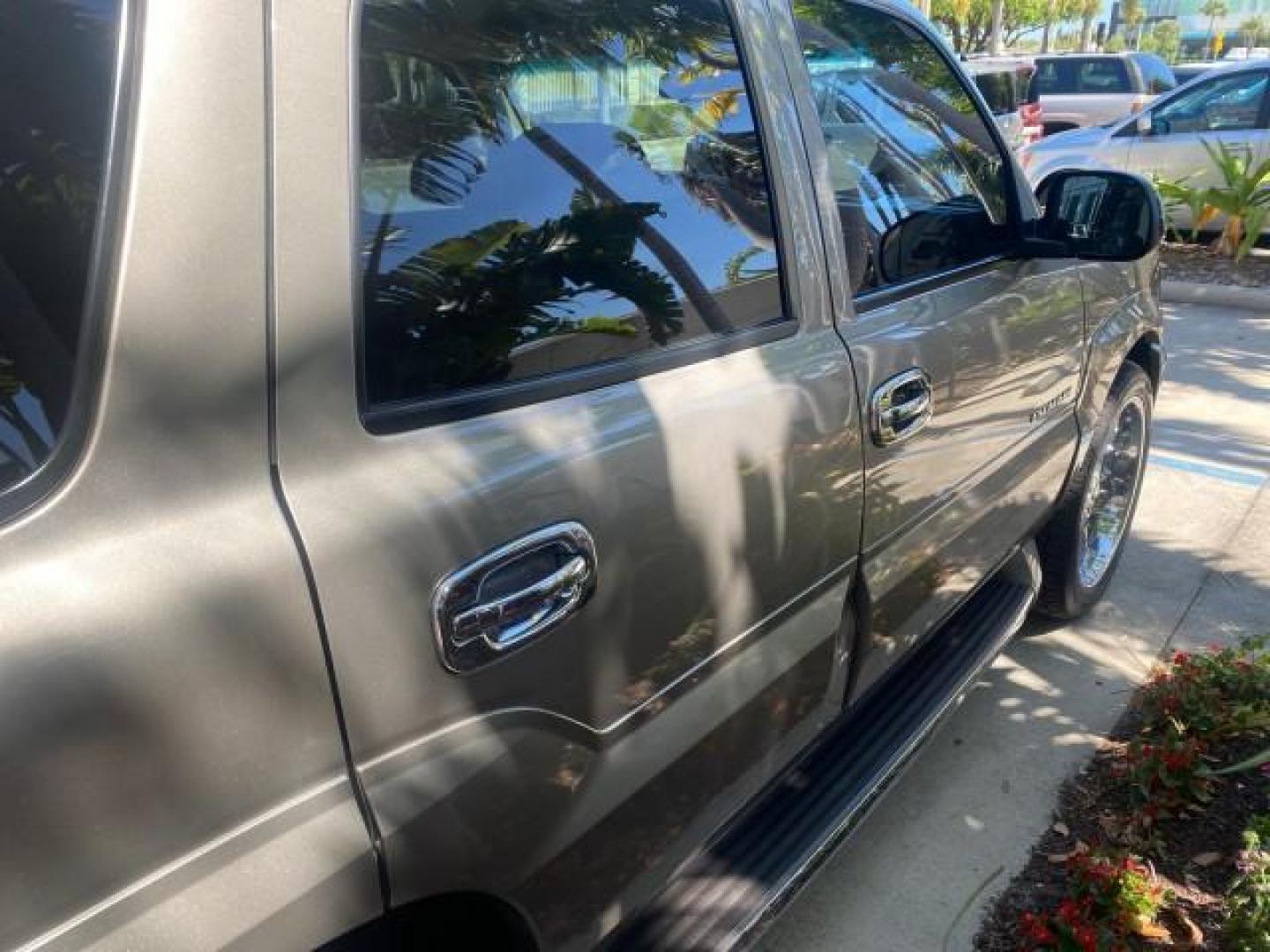 2002 Silver Sand /Shale Cadillac Escalade AWD I OWNER NO ACCIDENTS (1GYEK63N72R) with an 6.0L Vortec 1000 SFI V8 HO Engine engine, Automatic transmission, located at 4701 North Dixie Hwy, Pompano Beach, FL, 33064, (954) 422-2889, 26.240938, -80.123474 - OUR WEBPAGE FLORIDACARS1.COM HAS OVER 100 PHOTOS AND FREE CARFAX LINK 2002 CADILLAC ESCALADE VIN: 1GYEK63N72R215443 1 G Y E K 6 3 N 7 2 R 2 1 5 4 4 3 4 DOOR WAGON/SPORT UTILITY 6.0L V8 F GASOLINE ALL WHEEL DRIVE Top Features Alloy Wheels Running Boards Bed Liner Tow Hitch Cloth Seats Basic Features - Photo#82