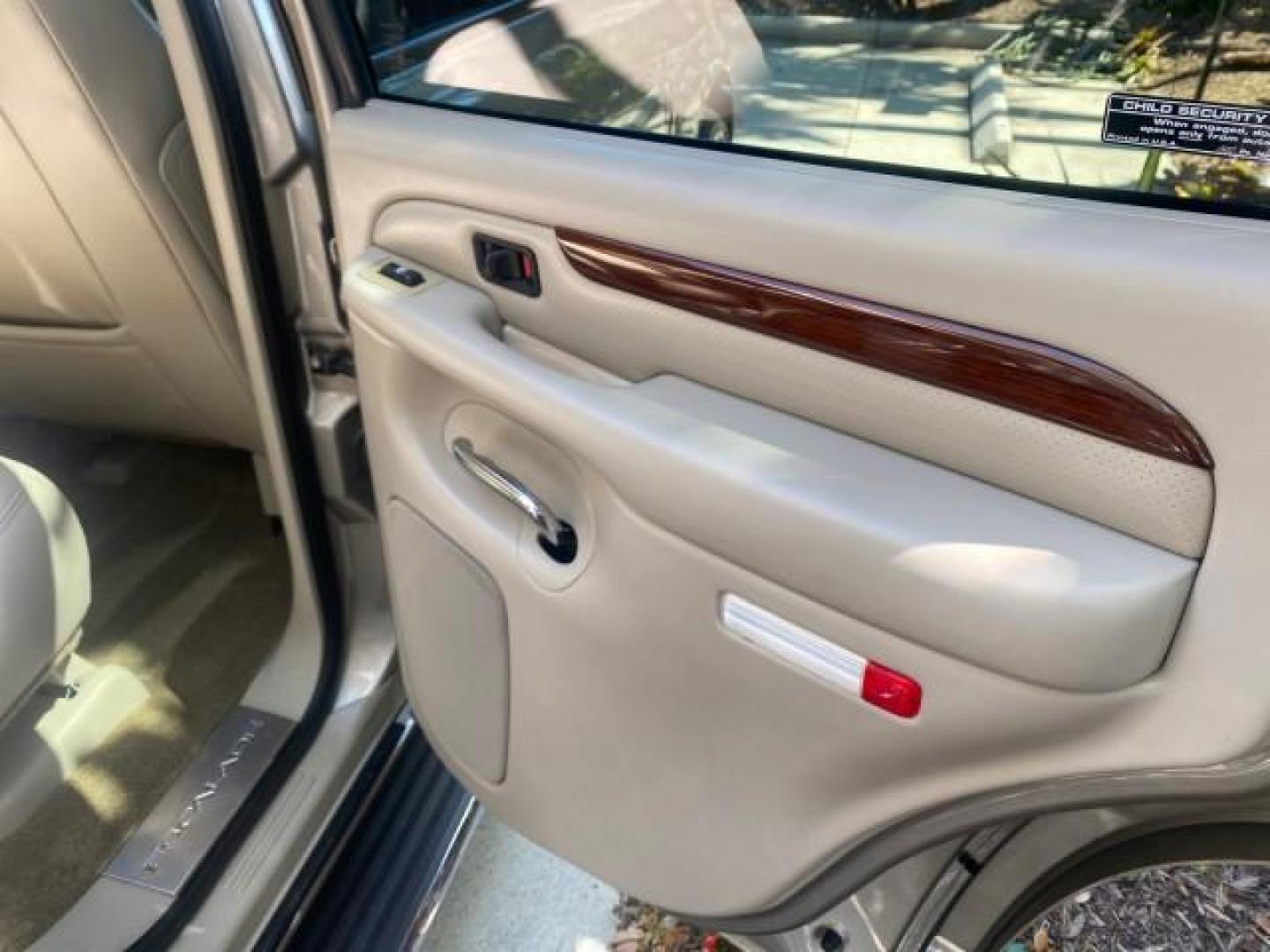 2002 Silver Sand /Shale Cadillac Escalade AWD I OWNER NO ACCIDENTS (1GYEK63N72R) with an 6.0L Vortec 1000 SFI V8 HO Engine engine, Automatic transmission, located at 4701 North Dixie Hwy, Pompano Beach, FL, 33064, (954) 422-2889, 26.240938, -80.123474 - OUR WEBPAGE FLORIDACARS1.COM HAS OVER 100 PHOTOS AND FREE CARFAX LINK 2002 CADILLAC ESCALADE VIN: 1GYEK63N72R215443 1 G Y E K 6 3 N 7 2 R 2 1 5 4 4 3 4 DOOR WAGON/SPORT UTILITY 6.0L V8 F GASOLINE ALL WHEEL DRIVE Top Features Alloy Wheels Running Boards Bed Liner Tow Hitch Cloth Seats Basic Features - Photo#85