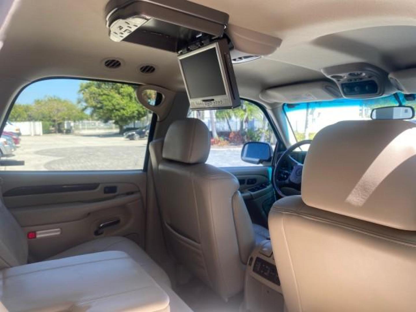 2002 Silver Sand /Shale Cadillac Escalade AWD I OWNER NO ACCIDENTS (1GYEK63N72R) with an 6.0L Vortec 1000 SFI V8 HO Engine engine, Automatic transmission, located at 4701 North Dixie Hwy, Pompano Beach, FL, 33064, (954) 422-2889, 26.240938, -80.123474 - OUR WEBPAGE FLORIDACARS1.COM HAS OVER 100 PHOTOS AND FREE CARFAX LINK 2002 CADILLAC ESCALADE VIN: 1GYEK63N72R215443 1 G Y E K 6 3 N 7 2 R 2 1 5 4 4 3 4 DOOR WAGON/SPORT UTILITY 6.0L V8 F GASOLINE ALL WHEEL DRIVE Top Features Alloy Wheels Running Boards Bed Liner Tow Hitch Cloth Seats Basic Features - Photo#88