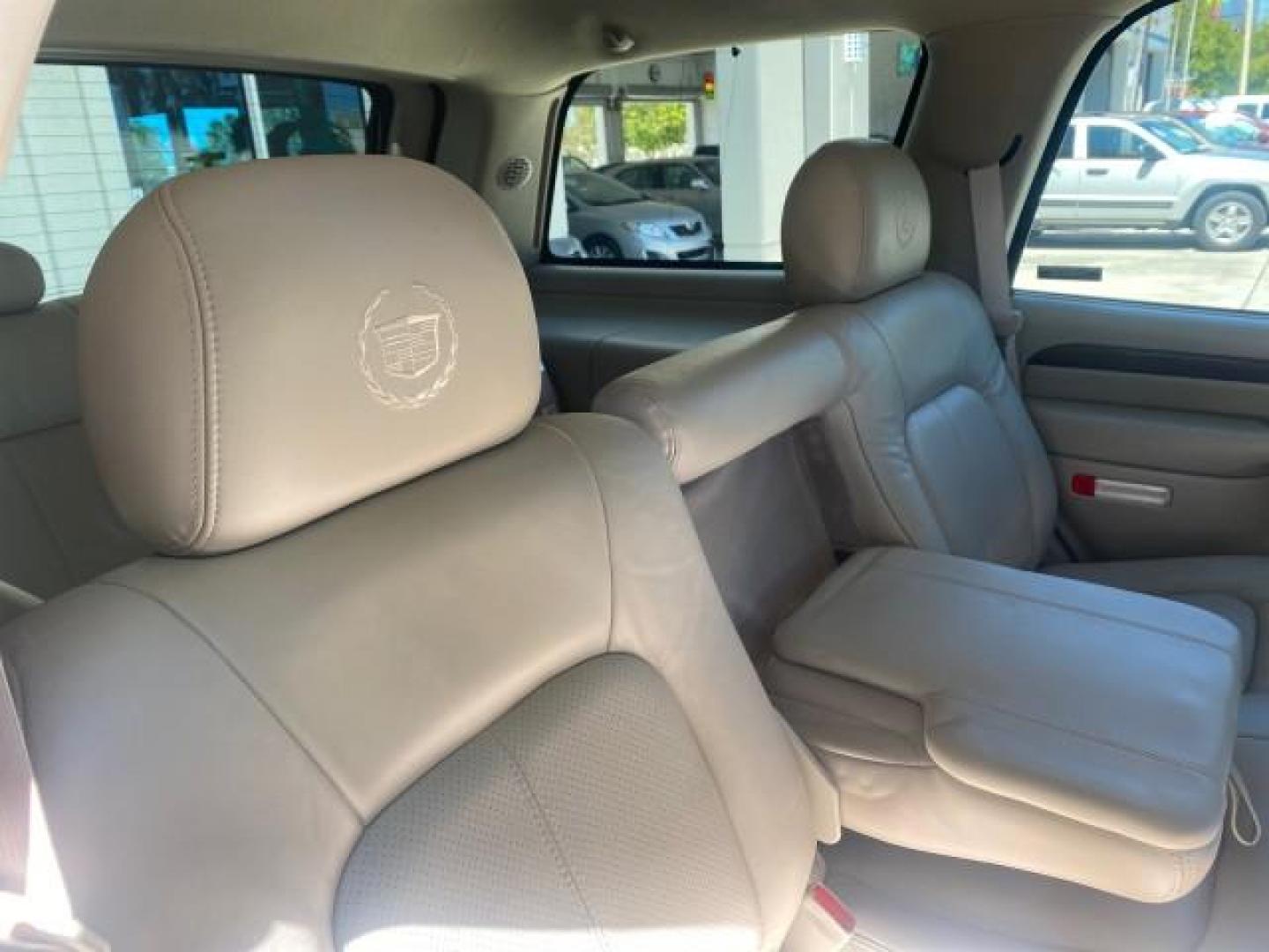 2002 Silver Sand /Shale Cadillac Escalade AWD I OWNER NO ACCIDENTS (1GYEK63N72R) with an 6.0L Vortec 1000 SFI V8 HO Engine engine, Automatic transmission, located at 4701 North Dixie Hwy, Pompano Beach, FL, 33064, (954) 422-2889, 26.240938, -80.123474 - OUR WEBPAGE FLORIDACARS1.COM HAS OVER 100 PHOTOS AND FREE CARFAX LINK 2002 CADILLAC ESCALADE VIN: 1GYEK63N72R215443 1 G Y E K 6 3 N 7 2 R 2 1 5 4 4 3 4 DOOR WAGON/SPORT UTILITY 6.0L V8 F GASOLINE ALL WHEEL DRIVE Top Features Alloy Wheels Running Boards Bed Liner Tow Hitch Cloth Seats Basic Features - Photo#89