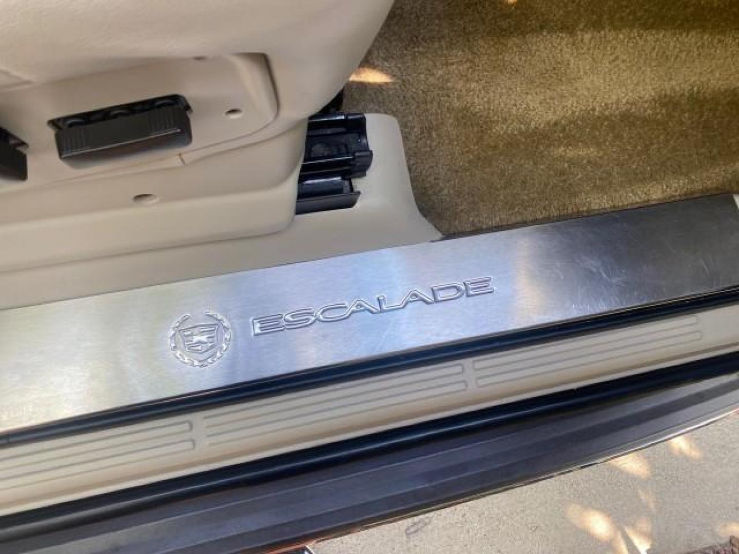 2002 Silver Sand /Shale Cadillac Escalade AWD I OWNER NO ACCIDENTS (1GYEK63N72R) with an 6.0L Vortec 1000 SFI V8 HO Engine engine, Automatic transmission, located at 4701 North Dixie Hwy, Pompano Beach, FL, 33064, (954) 422-2889, 26.240938, -80.123474 - OUR WEBPAGE FLORIDACARS1.COM HAS OVER 100 PHOTOS AND FREE CARFAX LINK 2002 CADILLAC ESCALADE VIN: 1GYEK63N72R215443 1 G Y E K 6 3 N 7 2 R 2 1 5 4 4 3 4 DOOR WAGON/SPORT UTILITY 6.0L V8 F GASOLINE ALL WHEEL DRIVE Top Features Alloy Wheels Running Boards Bed Liner Tow Hitch Cloth Seats Basic Features - Photo#95