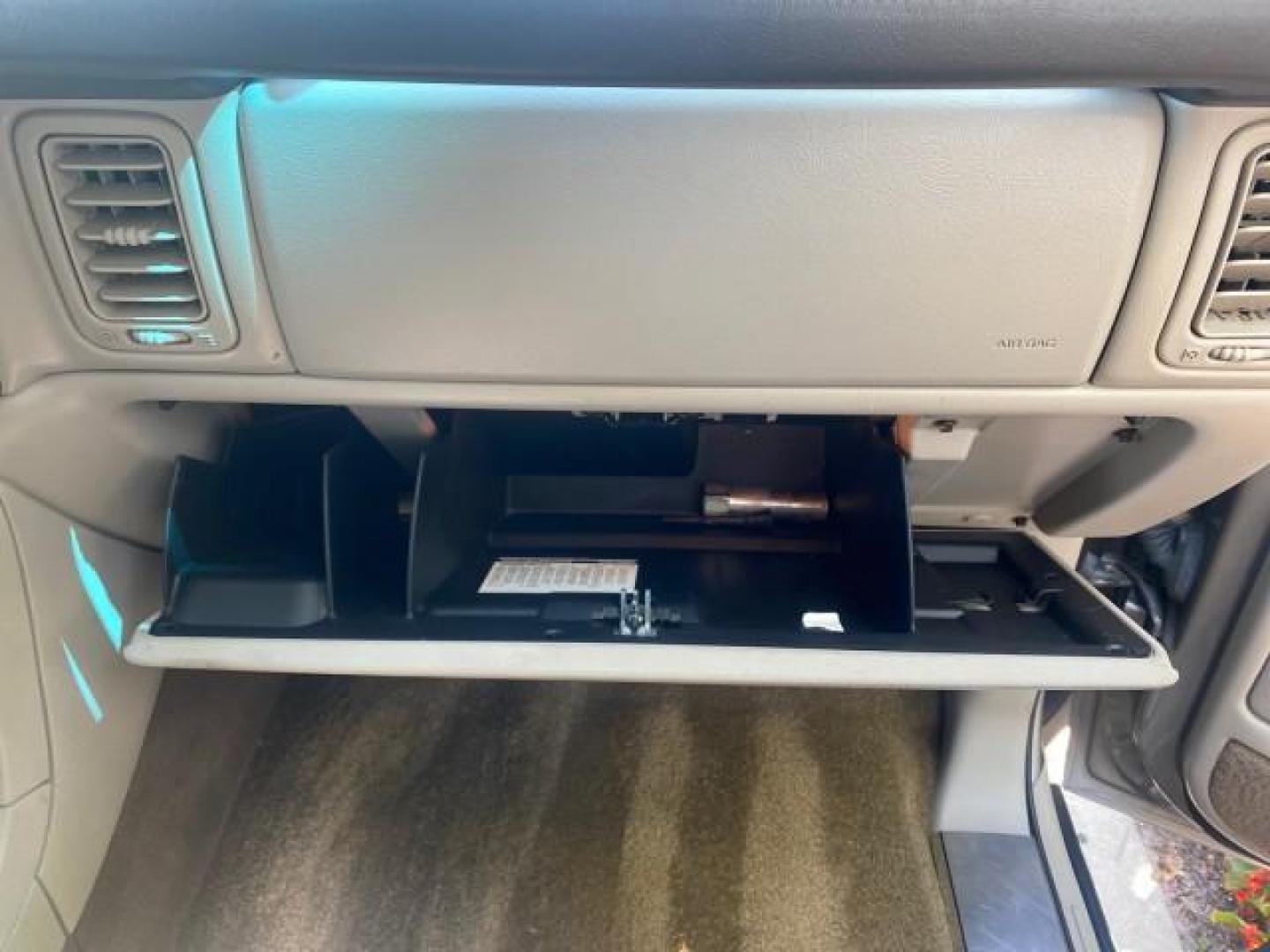 2002 Silver Sand /Shale Cadillac Escalade AWD I OWNER NO ACCIDENTS (1GYEK63N72R) with an 6.0L Vortec 1000 SFI V8 HO Engine engine, Automatic transmission, located at 4701 North Dixie Hwy, Pompano Beach, FL, 33064, (954) 422-2889, 26.240938, -80.123474 - OUR WEBPAGE FLORIDACARS1.COM HAS OVER 100 PHOTOS AND FREE CARFAX LINK 2002 CADILLAC ESCALADE VIN: 1GYEK63N72R215443 1 G Y E K 6 3 N 7 2 R 2 1 5 4 4 3 4 DOOR WAGON/SPORT UTILITY 6.0L V8 F GASOLINE ALL WHEEL DRIVE Top Features Alloy Wheels Running Boards Bed Liner Tow Hitch Cloth Seats Basic Features - Photo#97