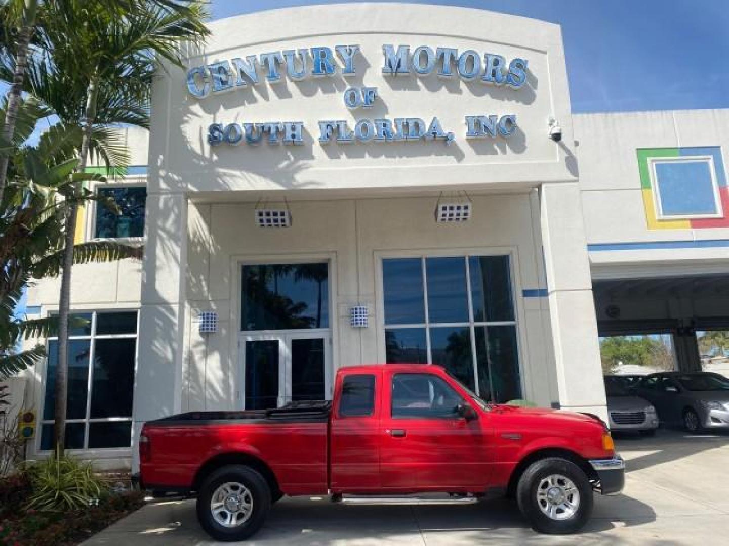 2005 Bright Red /Medium Dk Flint Ford Ranger XLT X CAB LOW MILES 55,254 (1FTZR14U75P) with an 3.0L MPFI V6 Engine engine, Automatic transmission, located at 4701 North Dixie Hwy, Pompano Beach, FL, 33064, (954) 422-2889, 26.240938, -80.123474 - OUR WEBPAGE FLORIDACARS1.COM HAS OVER 100 PHOTOS AND FREE CARFAX LINK 2005 FORD RANGER XLT XCAB VIN: 1FTZR14U75PA45984 1 F T Z R 1 4 U 7 5 P A 4 5 9 8 4 CLUB CAB PICKUP 3.0L V6 F 12V GASOLINE TOW PKG UPGRADED STEREO SYSTEM AND MORE REAR WHEEL DRIVE Top Features Alloy Wheels Running Boards Bed Liner - Photo#0