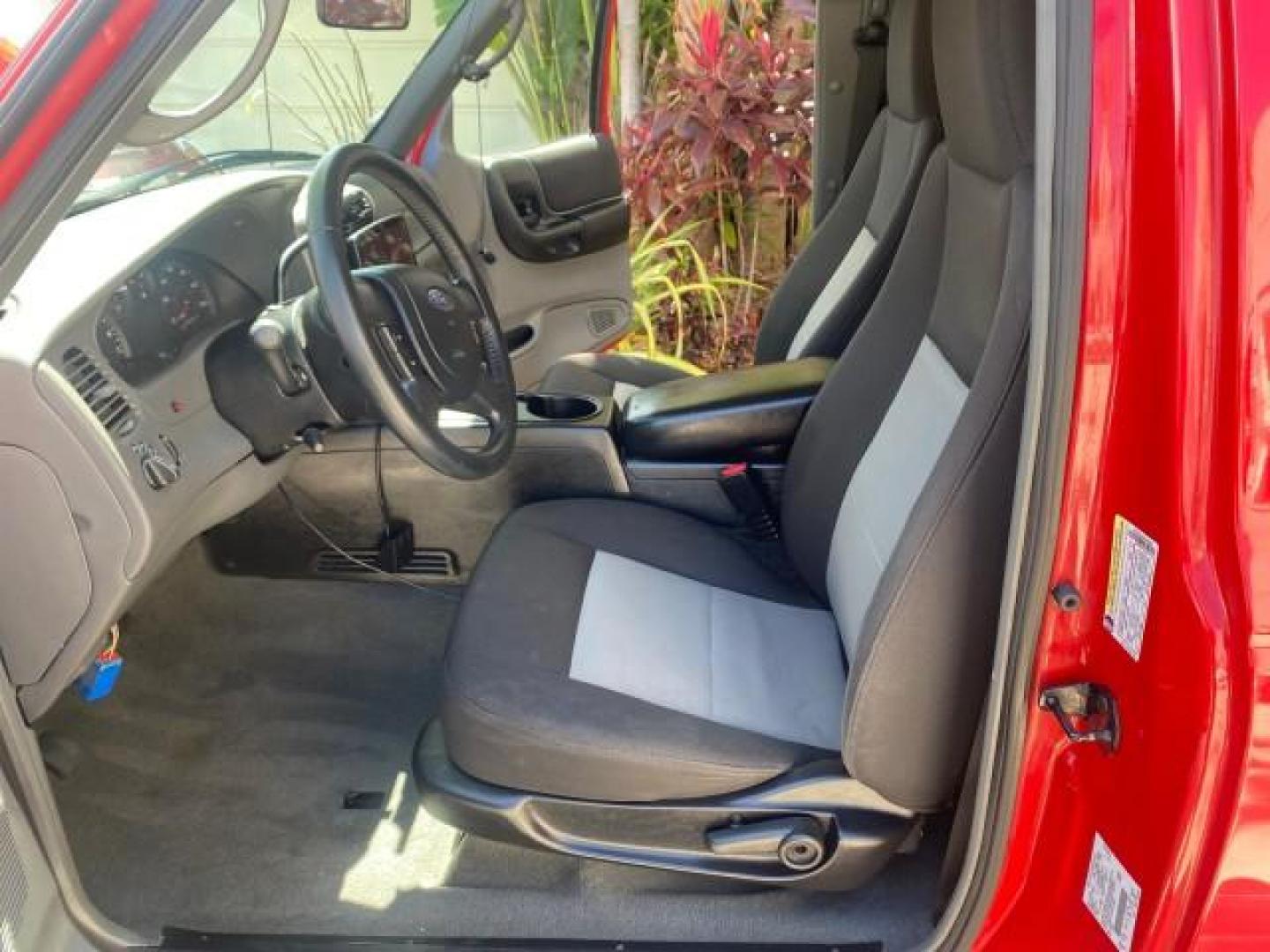 2005 Bright Red /Medium Dk Flint Ford Ranger XLT X CAB LOW MILES 55,254 (1FTZR14U75P) with an 3.0L MPFI V6 Engine engine, Automatic transmission, located at 4701 North Dixie Hwy, Pompano Beach, FL, 33064, (954) 422-2889, 26.240938, -80.123474 - OUR WEBPAGE FLORIDACARS1.COM HAS OVER 100 PHOTOS AND FREE CARFAX LINK 2005 FORD RANGER XLT XCAB VIN: 1FTZR14U75PA45984 1 F T Z R 1 4 U 7 5 P A 4 5 9 8 4 CLUB CAB PICKUP 3.0L V6 F 12V GASOLINE TOW PKG UPGRADED STEREO SYSTEM AND MORE REAR WHEEL DRIVE Top Features Alloy Wheels Running Boards Bed Liner - Photo#10