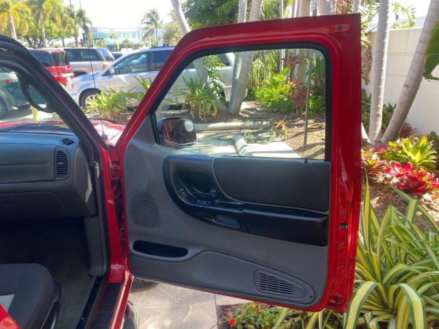 2005 Bright Red /Medium Dk Flint Ford Ranger XLT X CAB LOW MILES 55,254 (1FTZR14U75P) with an 3.0L MPFI V6 Engine engine, Automatic transmission, located at 4701 North Dixie Hwy, Pompano Beach, FL, 33064, (954) 422-2889, 26.240938, -80.123474 - OUR WEBPAGE FLORIDACARS1.COM HAS OVER 100 PHOTOS AND FREE CARFAX LINK 2005 FORD RANGER XLT XCAB VIN: 1FTZR14U75PA45984 1 F T Z R 1 4 U 7 5 P A 4 5 9 8 4 CLUB CAB PICKUP 3.0L V6 F 12V GASOLINE TOW PKG UPGRADED STEREO SYSTEM AND MORE REAR WHEEL DRIVE Top Features Alloy Wheels Running Boards Bed Liner - Photo#11