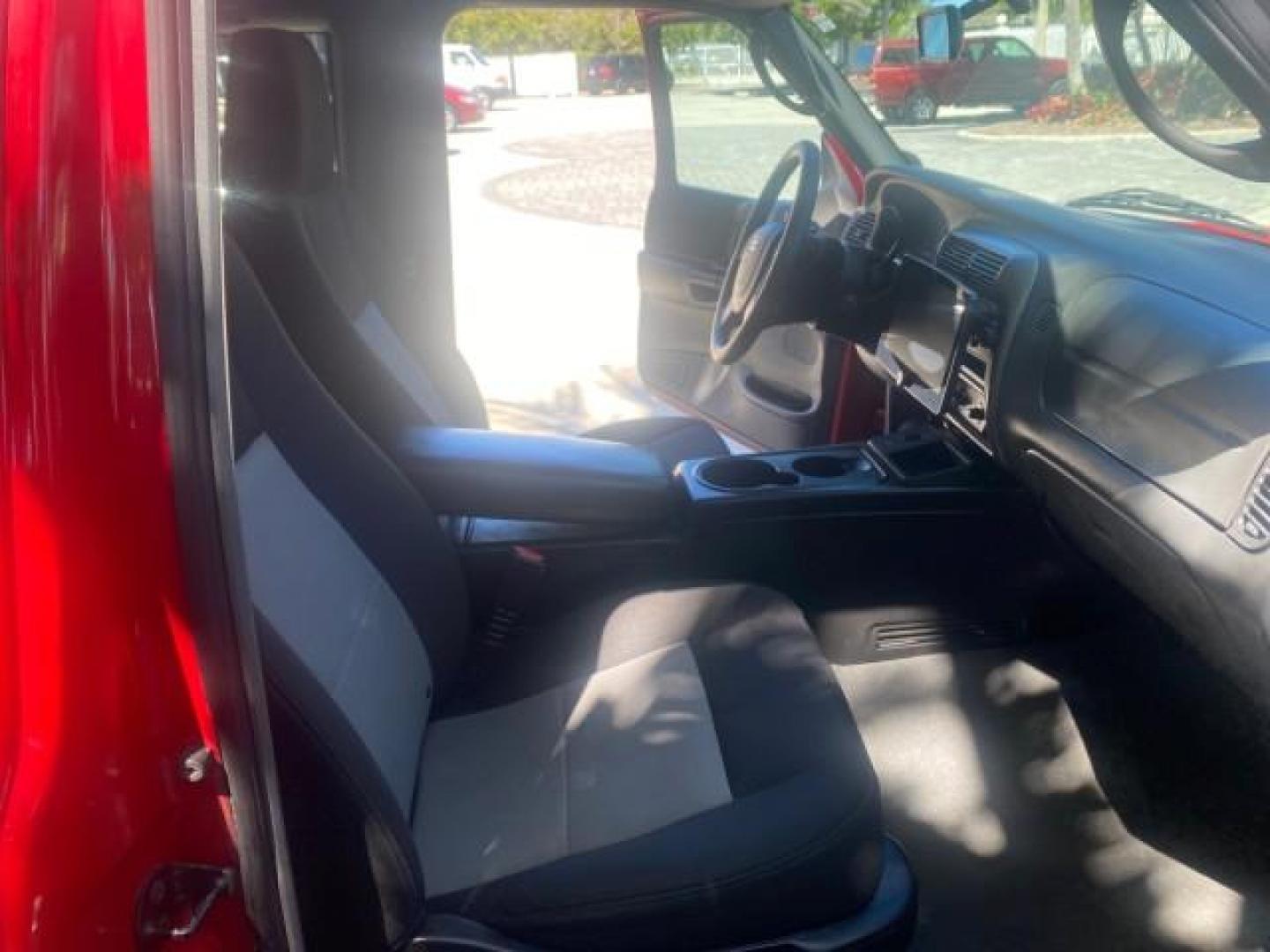 2005 Bright Red /Medium Dk Flint Ford Ranger XLT X CAB LOW MILES 55,254 (1FTZR14U75P) with an 3.0L MPFI V6 Engine engine, Automatic transmission, located at 4701 North Dixie Hwy, Pompano Beach, FL, 33064, (954) 422-2889, 26.240938, -80.123474 - OUR WEBPAGE FLORIDACARS1.COM HAS OVER 100 PHOTOS AND FREE CARFAX LINK 2005 FORD RANGER XLT XCAB VIN: 1FTZR14U75PA45984 1 F T Z R 1 4 U 7 5 P A 4 5 9 8 4 CLUB CAB PICKUP 3.0L V6 F 12V GASOLINE TOW PKG UPGRADED STEREO SYSTEM AND MORE REAR WHEEL DRIVE Top Features Alloy Wheels Running Boards Bed Liner - Photo#12