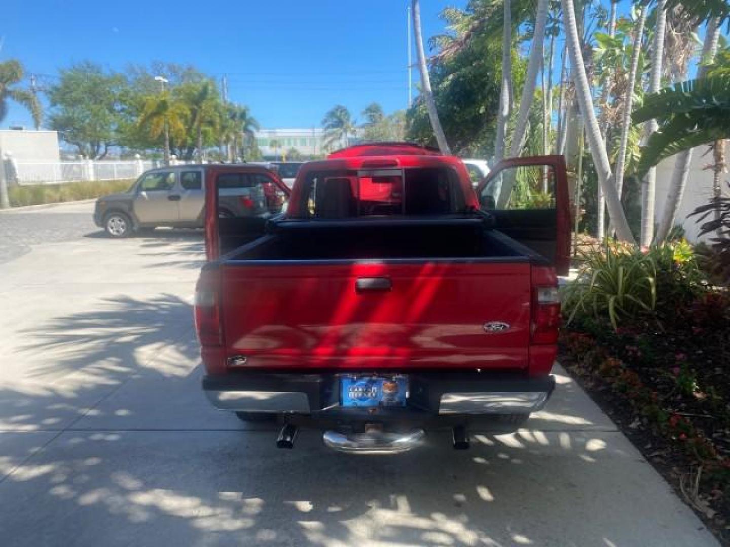 2005 Bright Red /Medium Dk Flint Ford Ranger XLT X CAB LOW MILES 55,254 (1FTZR14U75P) with an 3.0L MPFI V6 Engine engine, Automatic transmission, located at 4701 North Dixie Hwy, Pompano Beach, FL, 33064, (954) 422-2889, 26.240938, -80.123474 - OUR WEBPAGE FLORIDACARS1.COM HAS OVER 100 PHOTOS AND FREE CARFAX LINK 2005 FORD RANGER XLT XCAB VIN: 1FTZR14U75PA45984 1 F T Z R 1 4 U 7 5 P A 4 5 9 8 4 CLUB CAB PICKUP 3.0L V6 F 12V GASOLINE TOW PKG UPGRADED STEREO SYSTEM AND MORE REAR WHEEL DRIVE Top Features Alloy Wheels Running Boards Bed Liner - Photo#15