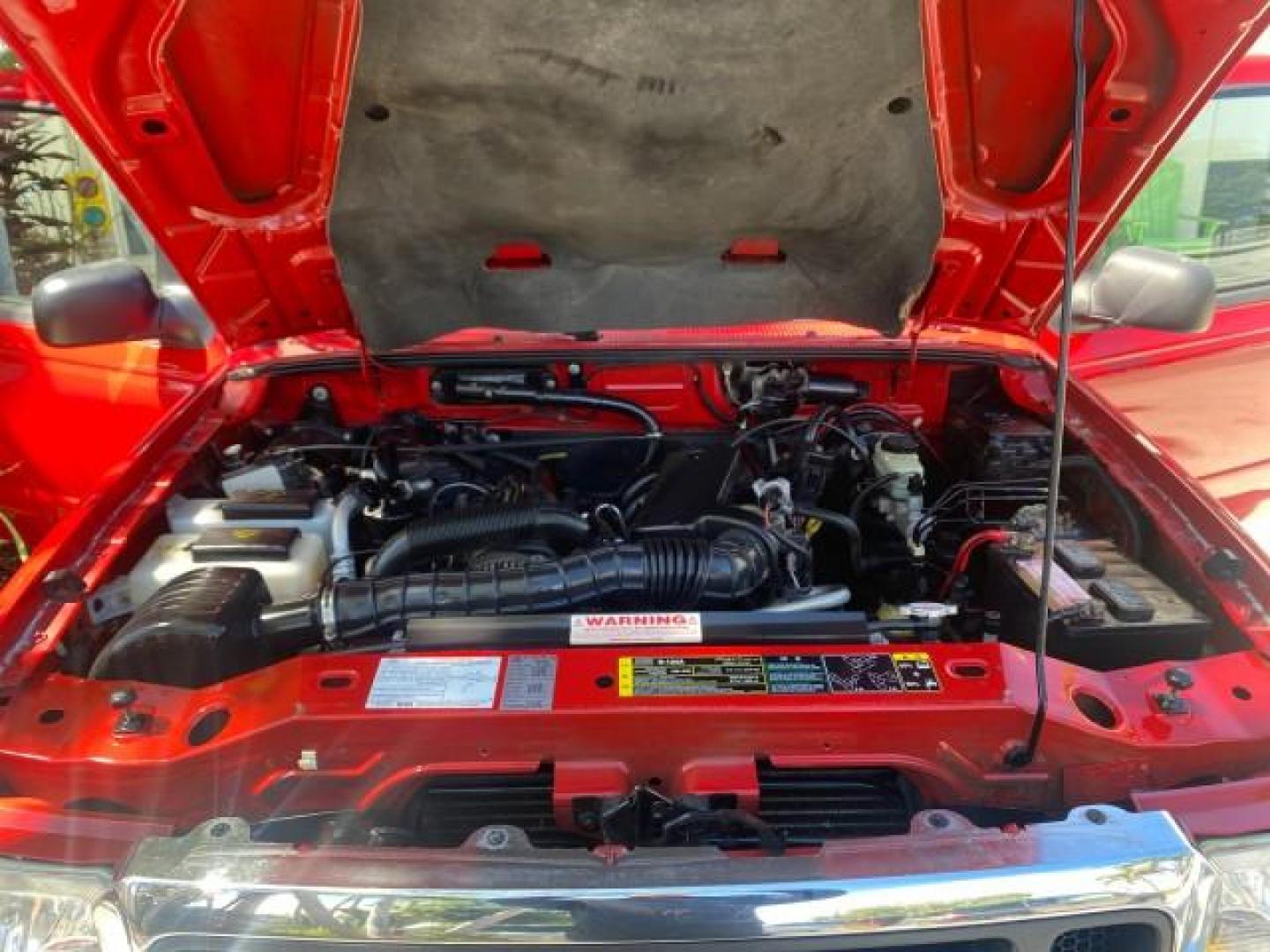 2005 Bright Red /Medium Dk Flint Ford Ranger XLT X CAB LOW MILES 55,254 (1FTZR14U75P) with an 3.0L MPFI V6 Engine engine, Automatic transmission, located at 4701 North Dixie Hwy, Pompano Beach, FL, 33064, (954) 422-2889, 26.240938, -80.123474 - OUR WEBPAGE FLORIDACARS1.COM HAS OVER 100 PHOTOS AND FREE CARFAX LINK 2005 FORD RANGER XLT XCAB VIN: 1FTZR14U75PA45984 1 F T Z R 1 4 U 7 5 P A 4 5 9 8 4 CLUB CAB PICKUP 3.0L V6 F 12V GASOLINE TOW PKG UPGRADED STEREO SYSTEM AND MORE REAR WHEEL DRIVE Top Features Alloy Wheels Running Boards Bed Liner - Photo#17