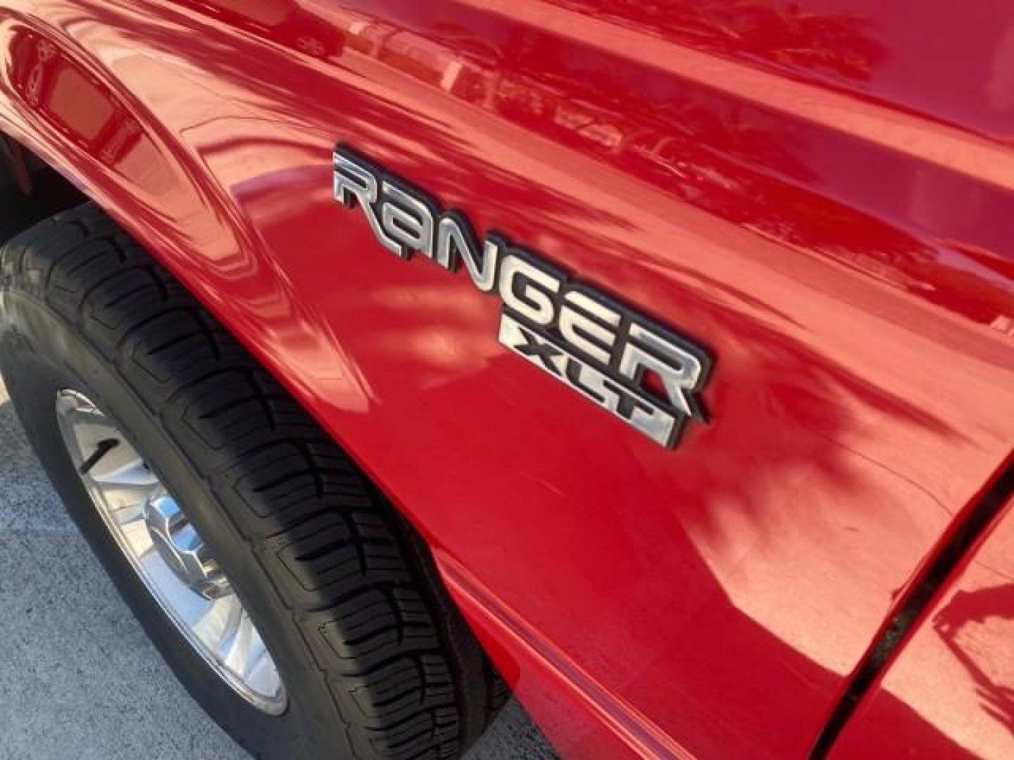 2005 Bright Red /Medium Dk Flint Ford Ranger XLT X CAB LOW MILES 55,254 (1FTZR14U75P) with an 3.0L MPFI V6 Engine engine, Automatic transmission, located at 4701 North Dixie Hwy, Pompano Beach, FL, 33064, (954) 422-2889, 26.240938, -80.123474 - OUR WEBPAGE FLORIDACARS1.COM HAS OVER 100 PHOTOS AND FREE CARFAX LINK 2005 FORD RANGER XLT XCAB VIN: 1FTZR14U75PA45984 1 F T Z R 1 4 U 7 5 P A 4 5 9 8 4 CLUB CAB PICKUP 3.0L V6 F 12V GASOLINE TOW PKG UPGRADED STEREO SYSTEM AND MORE REAR WHEEL DRIVE Top Features Alloy Wheels Running Boards Bed Liner - Photo#26