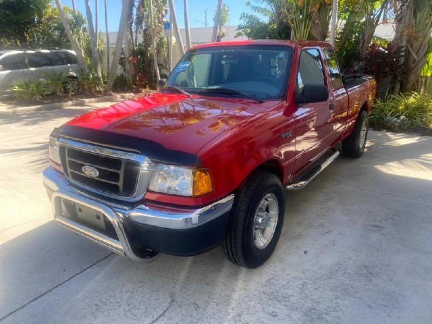 2005 Bright Red /Medium Dk Flint Ford Ranger XLT X CAB LOW MILES 55,254 (1FTZR14U75P) with an 3.0L MPFI V6 Engine engine, Automatic transmission, located at 4701 North Dixie Hwy, Pompano Beach, FL, 33064, (954) 422-2889, 26.240938, -80.123474 - OUR WEBPAGE FLORIDACARS1.COM HAS OVER 100 PHOTOS AND FREE CARFAX LINK 2005 FORD RANGER XLT XCAB VIN: 1FTZR14U75PA45984 1 F T Z R 1 4 U 7 5 P A 4 5 9 8 4 CLUB CAB PICKUP 3.0L V6 F 12V GASOLINE TOW PKG UPGRADED STEREO SYSTEM AND MORE REAR WHEEL DRIVE Top Features Alloy Wheels Running Boards Bed Liner - Photo#3