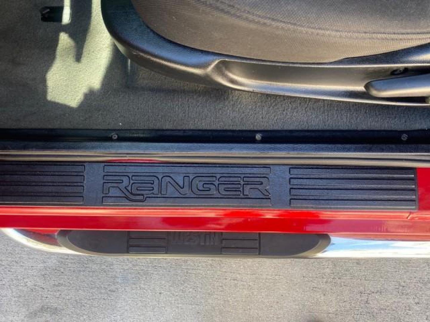 2005 Bright Red /Medium Dk Flint Ford Ranger XLT X CAB LOW MILES 55,254 (1FTZR14U75P) with an 3.0L MPFI V6 Engine engine, Automatic transmission, located at 4701 North Dixie Hwy, Pompano Beach, FL, 33064, (954) 422-2889, 26.240938, -80.123474 - OUR WEBPAGE FLORIDACARS1.COM HAS OVER 100 PHOTOS AND FREE CARFAX LINK 2005 FORD RANGER XLT XCAB VIN: 1FTZR14U75PA45984 1 F T Z R 1 4 U 7 5 P A 4 5 9 8 4 CLUB CAB PICKUP 3.0L V6 F 12V GASOLINE TOW PKG UPGRADED STEREO SYSTEM AND MORE REAR WHEEL DRIVE Top Features Alloy Wheels Running Boards Bed Liner - Photo#42