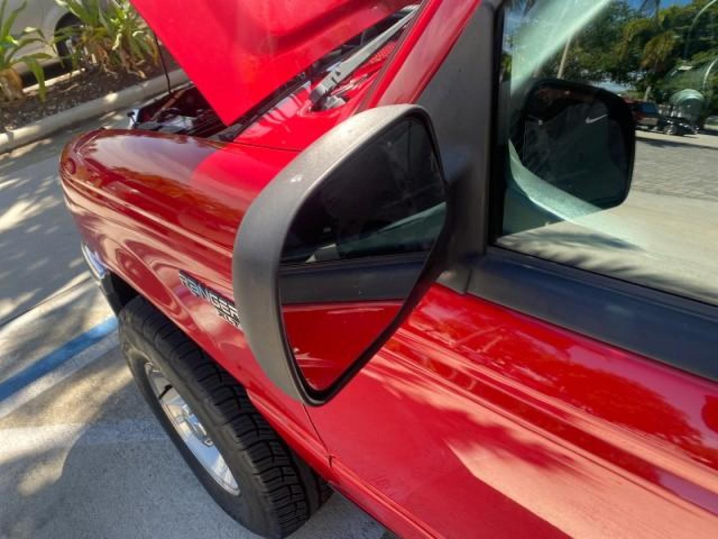2005 Bright Red /Medium Dk Flint Ford Ranger XLT X CAB LOW MILES 55,254 (1FTZR14U75P) with an 3.0L MPFI V6 Engine engine, Automatic transmission, located at 4701 North Dixie Hwy, Pompano Beach, FL, 33064, (954) 422-2889, 26.240938, -80.123474 - OUR WEBPAGE FLORIDACARS1.COM HAS OVER 100 PHOTOS AND FREE CARFAX LINK 2005 FORD RANGER XLT XCAB VIN: 1FTZR14U75PA45984 1 F T Z R 1 4 U 7 5 P A 4 5 9 8 4 CLUB CAB PICKUP 3.0L V6 F 12V GASOLINE TOW PKG UPGRADED STEREO SYSTEM AND MORE REAR WHEEL DRIVE Top Features Alloy Wheels Running Boards Bed Liner - Photo#46