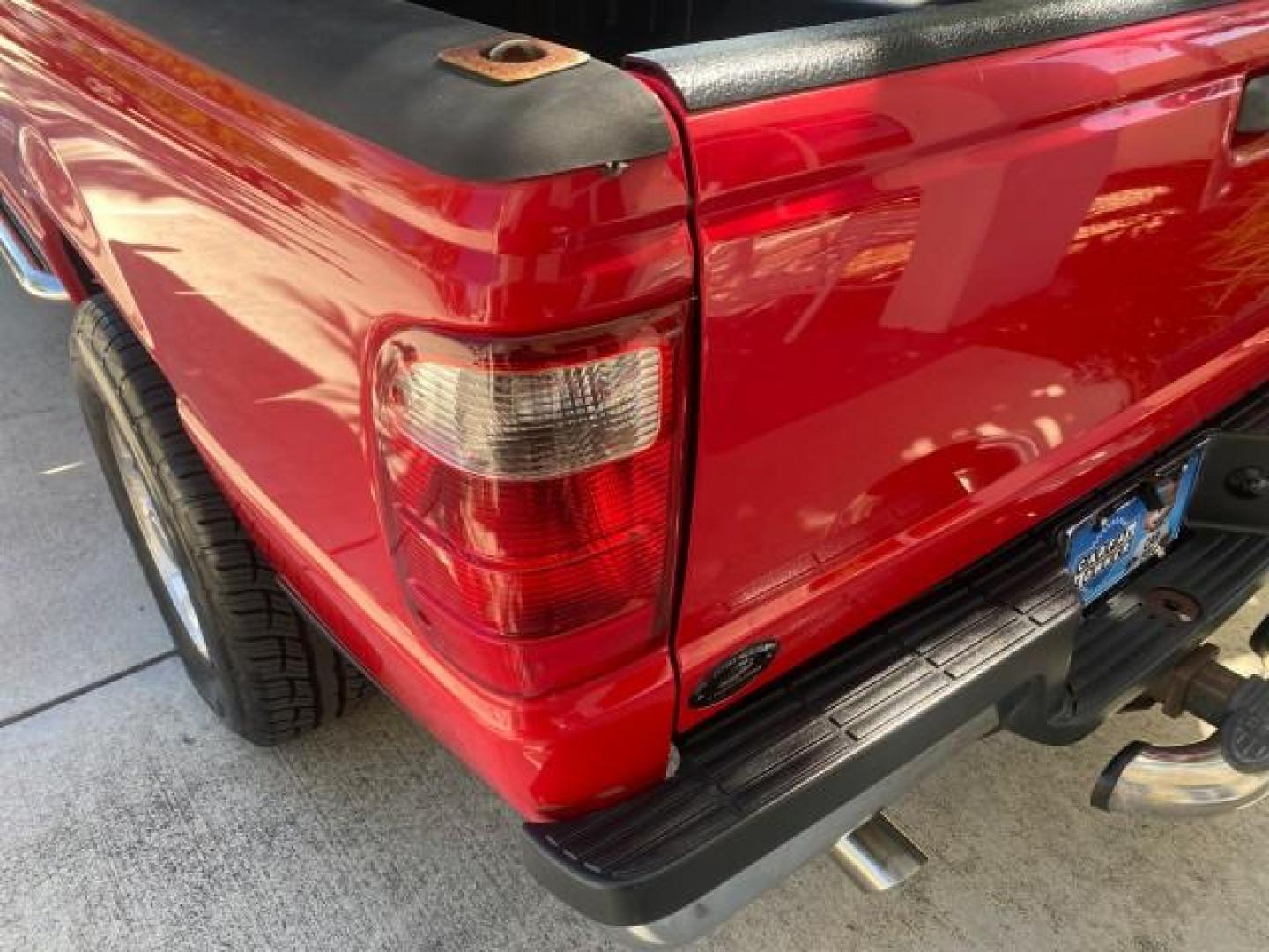 2005 Bright Red /Medium Dk Flint Ford Ranger XLT X CAB LOW MILES 55,254 (1FTZR14U75P) with an 3.0L MPFI V6 Engine engine, Automatic transmission, located at 4701 North Dixie Hwy, Pompano Beach, FL, 33064, (954) 422-2889, 26.240938, -80.123474 - OUR WEBPAGE FLORIDACARS1.COM HAS OVER 100 PHOTOS AND FREE CARFAX LINK 2005 FORD RANGER XLT XCAB VIN: 1FTZR14U75PA45984 1 F T Z R 1 4 U 7 5 P A 4 5 9 8 4 CLUB CAB PICKUP 3.0L V6 F 12V GASOLINE TOW PKG UPGRADED STEREO SYSTEM AND MORE REAR WHEEL DRIVE Top Features Alloy Wheels Running Boards Bed Liner - Photo#57