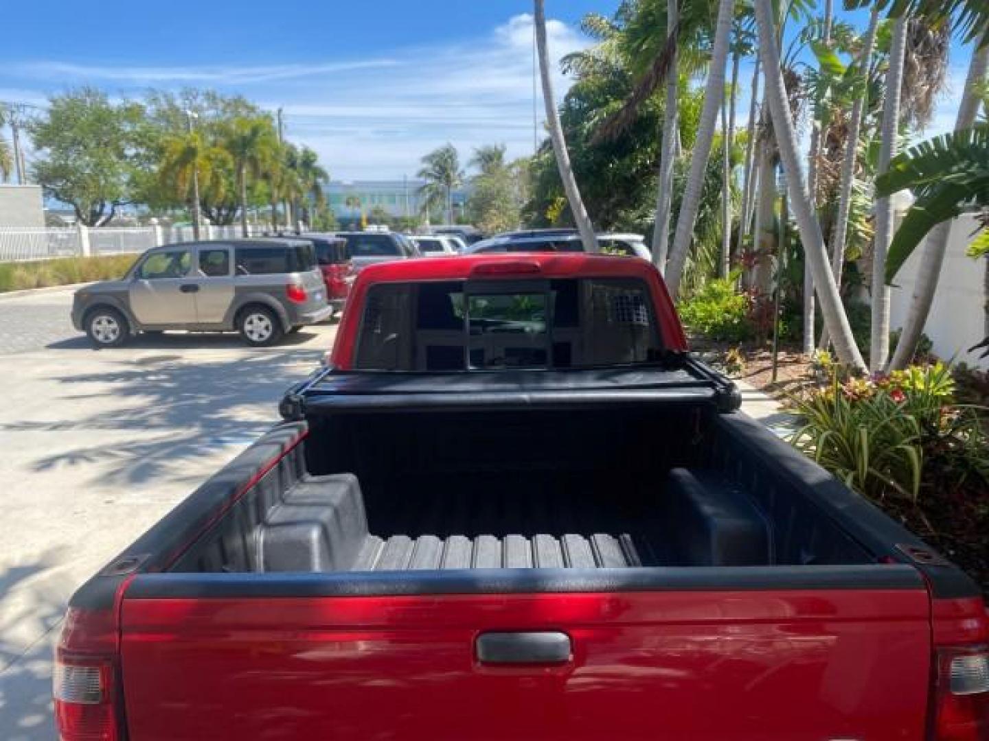 2005 Bright Red /Medium Dk Flint Ford Ranger XLT X CAB LOW MILES 55,254 (1FTZR14U75P) with an 3.0L MPFI V6 Engine engine, Automatic transmission, located at 4701 North Dixie Hwy, Pompano Beach, FL, 33064, (954) 422-2889, 26.240938, -80.123474 - OUR WEBPAGE FLORIDACARS1.COM HAS OVER 100 PHOTOS AND FREE CARFAX LINK 2005 FORD RANGER XLT XCAB VIN: 1FTZR14U75PA45984 1 F T Z R 1 4 U 7 5 P A 4 5 9 8 4 CLUB CAB PICKUP 3.0L V6 F 12V GASOLINE TOW PKG UPGRADED STEREO SYSTEM AND MORE REAR WHEEL DRIVE Top Features Alloy Wheels Running Boards Bed Liner - Photo#58