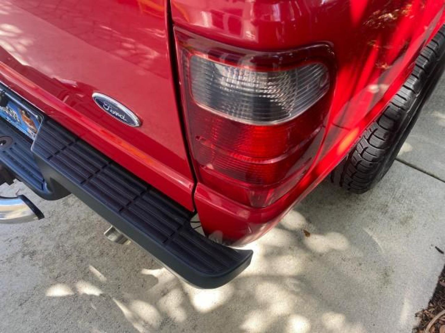 2005 Bright Red /Medium Dk Flint Ford Ranger XLT X CAB LOW MILES 55,254 (1FTZR14U75P) with an 3.0L MPFI V6 Engine engine, Automatic transmission, located at 4701 North Dixie Hwy, Pompano Beach, FL, 33064, (954) 422-2889, 26.240938, -80.123474 - OUR WEBPAGE FLORIDACARS1.COM HAS OVER 100 PHOTOS AND FREE CARFAX LINK 2005 FORD RANGER XLT XCAB VIN: 1FTZR14U75PA45984 1 F T Z R 1 4 U 7 5 P A 4 5 9 8 4 CLUB CAB PICKUP 3.0L V6 F 12V GASOLINE TOW PKG UPGRADED STEREO SYSTEM AND MORE REAR WHEEL DRIVE Top Features Alloy Wheels Running Boards Bed Liner - Photo#62