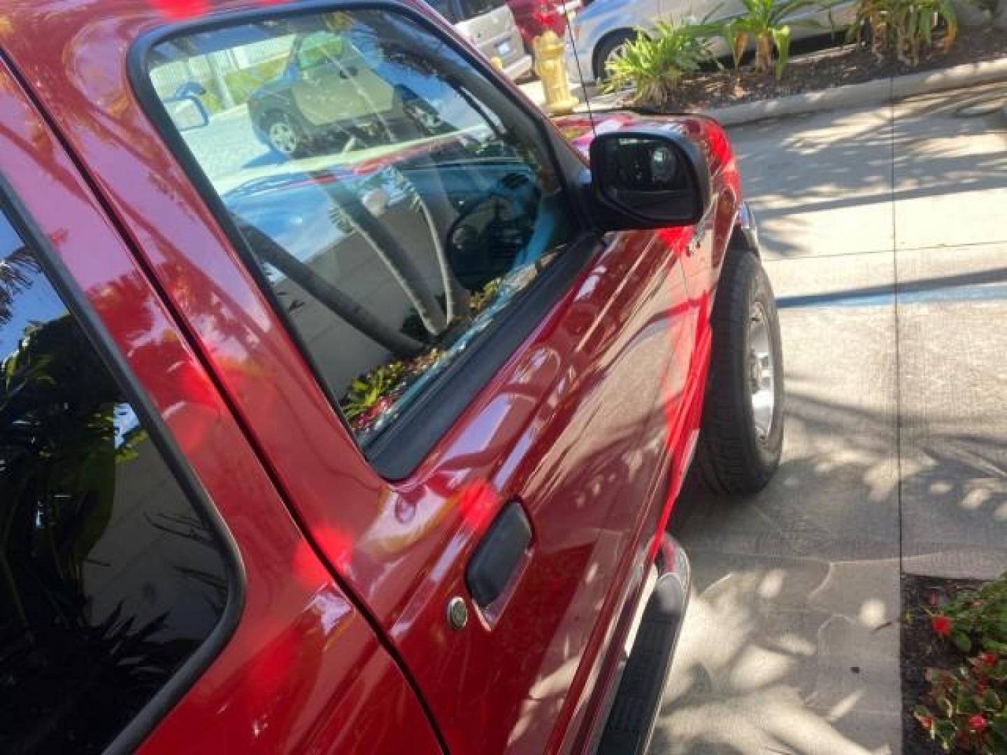 2005 Bright Red /Medium Dk Flint Ford Ranger XLT X CAB LOW MILES 55,254 (1FTZR14U75P) with an 3.0L MPFI V6 Engine engine, Automatic transmission, located at 4701 North Dixie Hwy, Pompano Beach, FL, 33064, (954) 422-2889, 26.240938, -80.123474 - OUR WEBPAGE FLORIDACARS1.COM HAS OVER 100 PHOTOS AND FREE CARFAX LINK 2005 FORD RANGER XLT XCAB VIN: 1FTZR14U75PA45984 1 F T Z R 1 4 U 7 5 P A 4 5 9 8 4 CLUB CAB PICKUP 3.0L V6 F 12V GASOLINE TOW PKG UPGRADED STEREO SYSTEM AND MORE REAR WHEEL DRIVE Top Features Alloy Wheels Running Boards Bed Liner - Photo#67