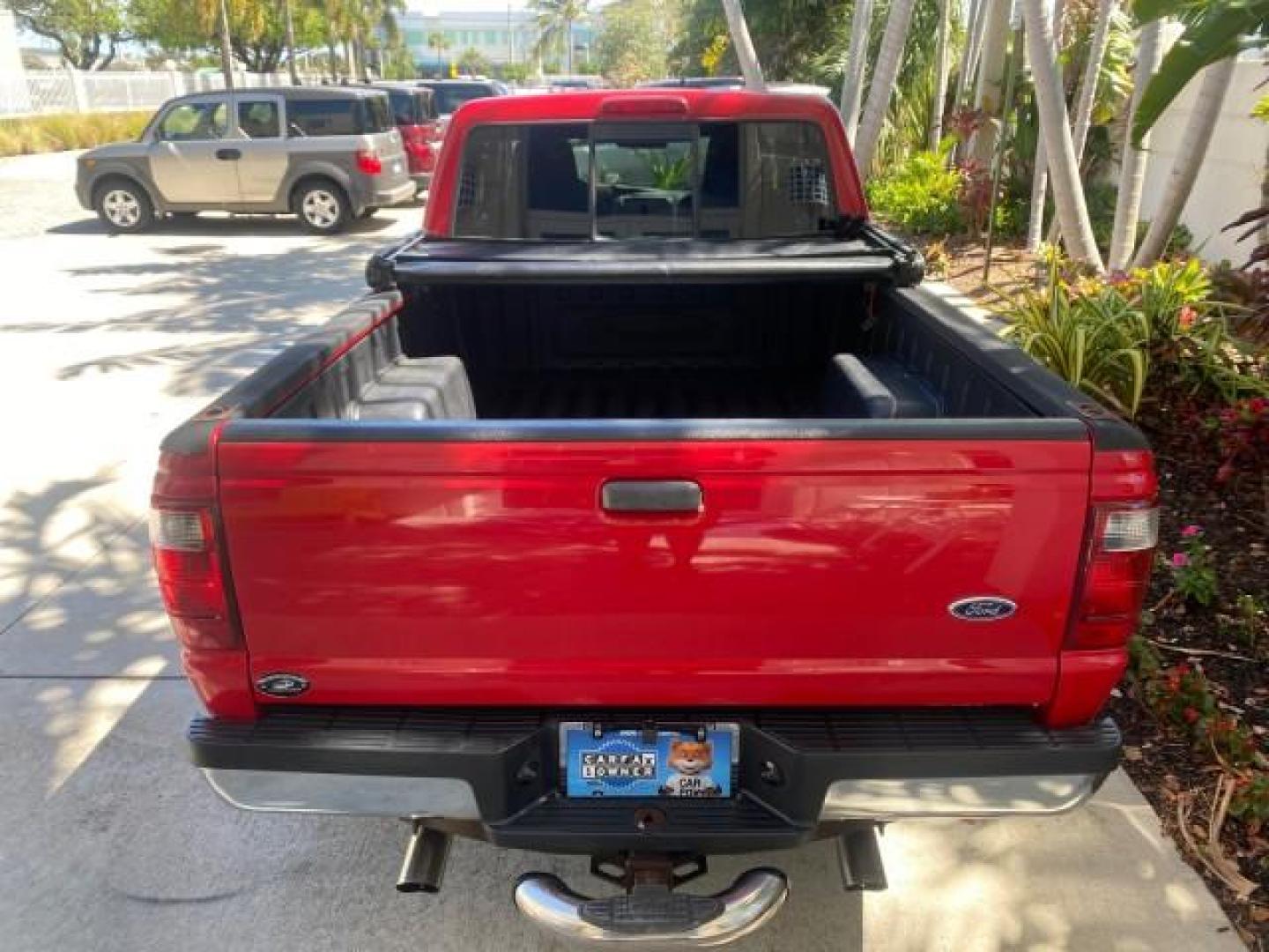 2005 Bright Red /Medium Dk Flint Ford Ranger XLT X CAB LOW MILES 55,254 (1FTZR14U75P) with an 3.0L MPFI V6 Engine engine, Automatic transmission, located at 4701 North Dixie Hwy, Pompano Beach, FL, 33064, (954) 422-2889, 26.240938, -80.123474 - OUR WEBPAGE FLORIDACARS1.COM HAS OVER 100 PHOTOS AND FREE CARFAX LINK 2005 FORD RANGER XLT XCAB VIN: 1FTZR14U75PA45984 1 F T Z R 1 4 U 7 5 P A 4 5 9 8 4 CLUB CAB PICKUP 3.0L V6 F 12V GASOLINE TOW PKG UPGRADED STEREO SYSTEM AND MORE REAR WHEEL DRIVE Top Features Alloy Wheels Running Boards Bed Liner - Photo#6