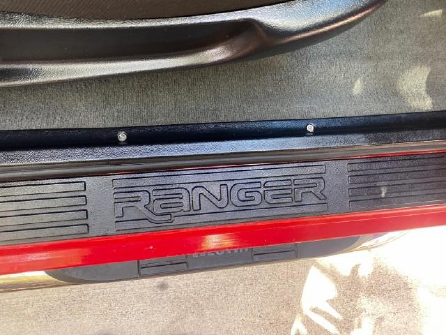 2005 Bright Red /Medium Dk Flint Ford Ranger XLT X CAB LOW MILES 55,254 (1FTZR14U75P) with an 3.0L MPFI V6 Engine engine, Automatic transmission, located at 4701 North Dixie Hwy, Pompano Beach, FL, 33064, (954) 422-2889, 26.240938, -80.123474 - OUR WEBPAGE FLORIDACARS1.COM HAS OVER 100 PHOTOS AND FREE CARFAX LINK 2005 FORD RANGER XLT XCAB VIN: 1FTZR14U75PA45984 1 F T Z R 1 4 U 7 5 P A 4 5 9 8 4 CLUB CAB PICKUP 3.0L V6 F 12V GASOLINE TOW PKG UPGRADED STEREO SYSTEM AND MORE REAR WHEEL DRIVE Top Features Alloy Wheels Running Boards Bed Liner - Photo#76