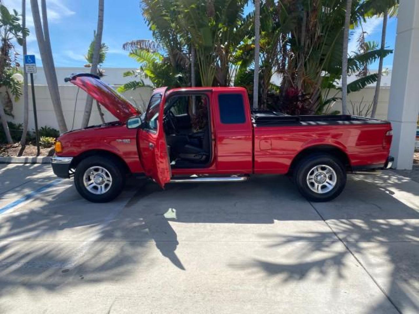 2005 Bright Red /Medium Dk Flint Ford Ranger XLT X CAB LOW MILES 55,254 (1FTZR14U75P) with an 3.0L MPFI V6 Engine engine, Automatic transmission, located at 4701 North Dixie Hwy, Pompano Beach, FL, 33064, (954) 422-2889, 26.240938, -80.123474 - OUR WEBPAGE FLORIDACARS1.COM HAS OVER 100 PHOTOS AND FREE CARFAX LINK 2005 FORD RANGER XLT XCAB VIN: 1FTZR14U75PA45984 1 F T Z R 1 4 U 7 5 P A 4 5 9 8 4 CLUB CAB PICKUP 3.0L V6 F 12V GASOLINE TOW PKG UPGRADED STEREO SYSTEM AND MORE REAR WHEEL DRIVE Top Features Alloy Wheels Running Boards Bed Liner - Photo#8