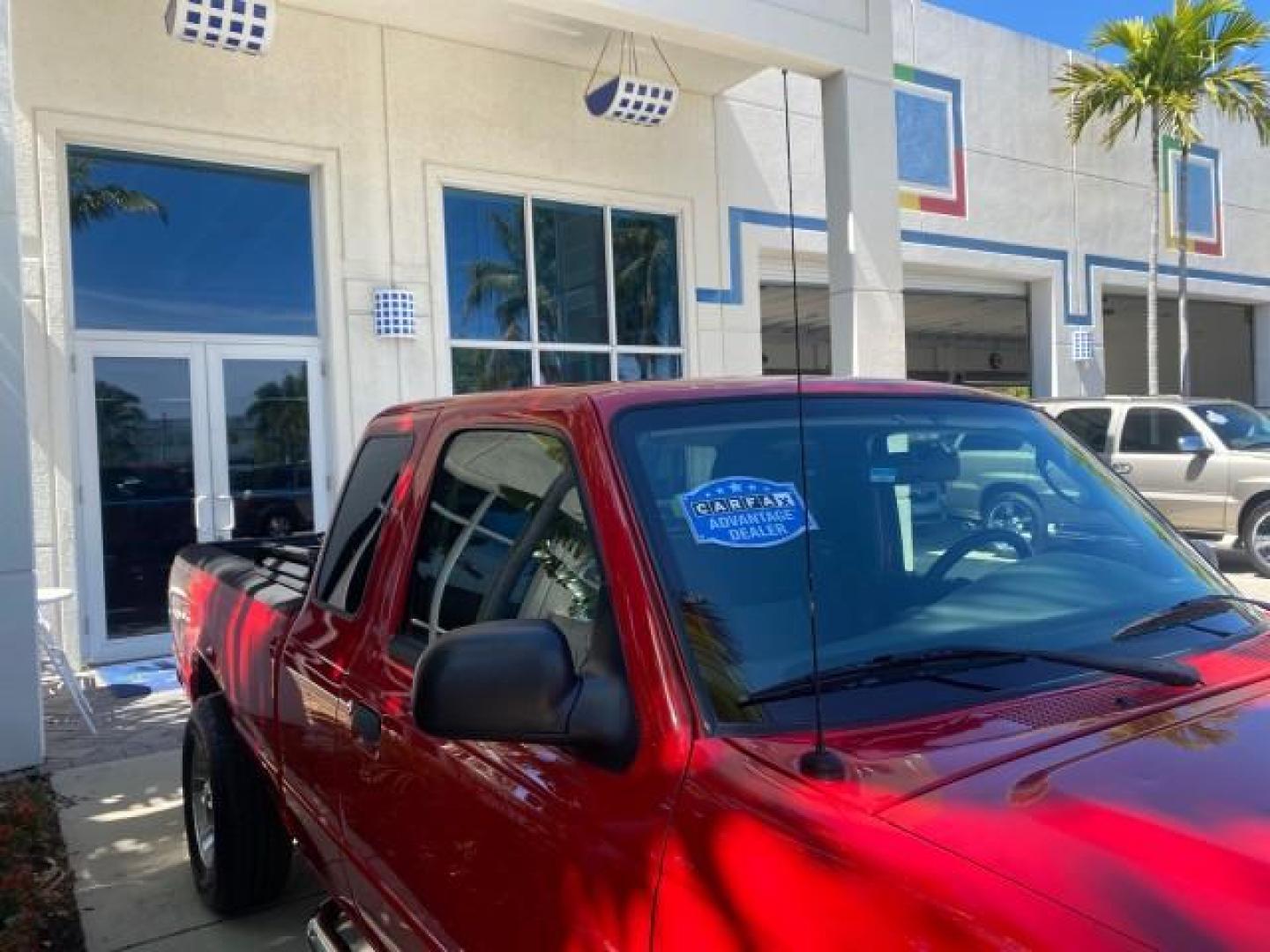 2005 Bright Red /Medium Dk Flint Ford Ranger XLT X CAB LOW MILES 55,254 (1FTZR14U75P) with an 3.0L MPFI V6 Engine engine, Automatic transmission, located at 4701 North Dixie Hwy, Pompano Beach, FL, 33064, (954) 422-2889, 26.240938, -80.123474 - OUR WEBPAGE FLORIDACARS1.COM HAS OVER 100 PHOTOS AND FREE CARFAX LINK 2005 FORD RANGER XLT XCAB VIN: 1FTZR14U75PA45984 1 F T Z R 1 4 U 7 5 P A 4 5 9 8 4 CLUB CAB PICKUP 3.0L V6 F 12V GASOLINE TOW PKG UPGRADED STEREO SYSTEM AND MORE REAR WHEEL DRIVE Top Features Alloy Wheels Running Boards Bed Liner - Photo#91