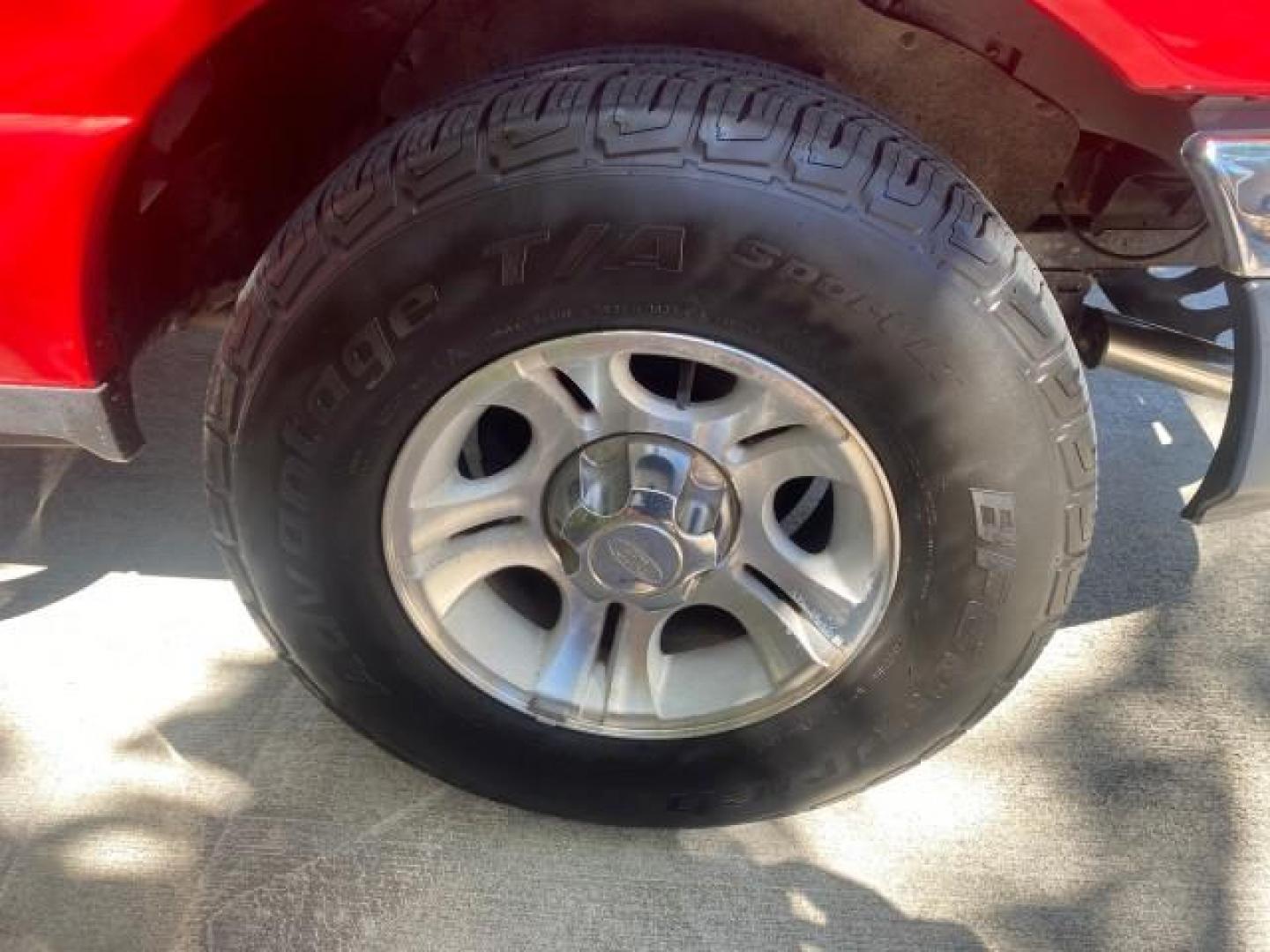 2005 Bright Red /Medium Dk Flint Ford Ranger XLT X CAB LOW MILES 55,254 (1FTZR14U75P) with an 3.0L MPFI V6 Engine engine, Automatic transmission, located at 4701 North Dixie Hwy, Pompano Beach, FL, 33064, (954) 422-2889, 26.240938, -80.123474 - OUR WEBPAGE FLORIDACARS1.COM HAS OVER 100 PHOTOS AND FREE CARFAX LINK 2005 FORD RANGER XLT XCAB VIN: 1FTZR14U75PA45984 1 F T Z R 1 4 U 7 5 P A 4 5 9 8 4 CLUB CAB PICKUP 3.0L V6 F 12V GASOLINE TOW PKG UPGRADED STEREO SYSTEM AND MORE REAR WHEEL DRIVE Top Features Alloy Wheels Running Boards Bed Liner - Photo#93