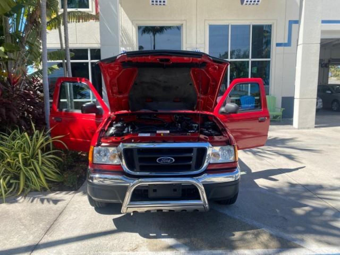 2005 Bright Red /Medium Dk Flint Ford Ranger XLT X CAB LOW MILES 55,254 (1FTZR14U75P) with an 3.0L MPFI V6 Engine engine, Automatic transmission, located at 4701 North Dixie Hwy, Pompano Beach, FL, 33064, (954) 422-2889, 26.240938, -80.123474 - OUR WEBPAGE FLORIDACARS1.COM HAS OVER 100 PHOTOS AND FREE CARFAX LINK 2005 FORD RANGER XLT XCAB VIN: 1FTZR14U75PA45984 1 F T Z R 1 4 U 7 5 P A 4 5 9 8 4 CLUB CAB PICKUP 3.0L V6 F 12V GASOLINE TOW PKG UPGRADED STEREO SYSTEM AND MORE REAR WHEEL DRIVE Top Features Alloy Wheels Running Boards Bed Liner - Photo#96