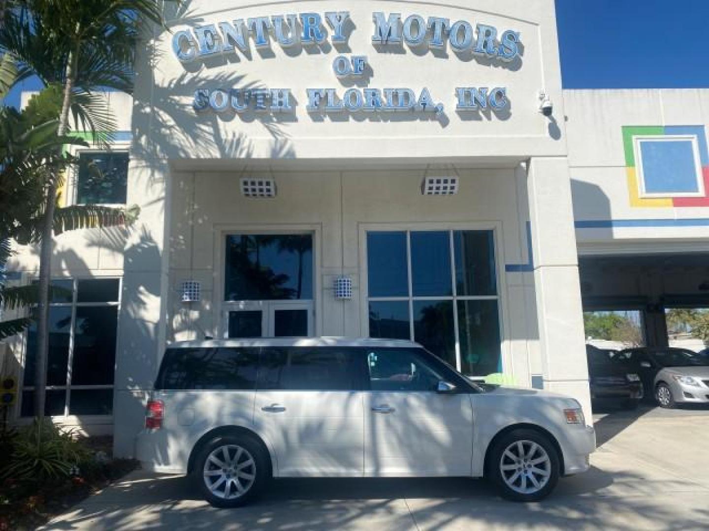 2009 White Suede /Medium Light Stone Ford Flex Limited LEATHER SUNROOF (2FMDK53C99B) with an 3.5L V6 Duratec Engine engine, Automatic transmission, located at 4701 North Dixie Hwy, Pompano Beach, FL, 33064, (954) 422-2889, 26.240938, -80.123474 - OUR WEBPAGE FLORIDACARS1.COM HAS OVER 100 PHOTOS AND FREE CARFAX LINK 2009 FORD FLEX VIN: 2FMDK53C99BA12573 4 DOOR LIMITED FWD 3.5L V6 DURATEC ENGINE GASOLINE FRONT WHEEL DRIVE Highlighted Features Bed Liner Cloth Seats ABS Brakes Automatic Transmission Power Locks AM/FM Stereo CD Audio Power Mirror - Photo#0