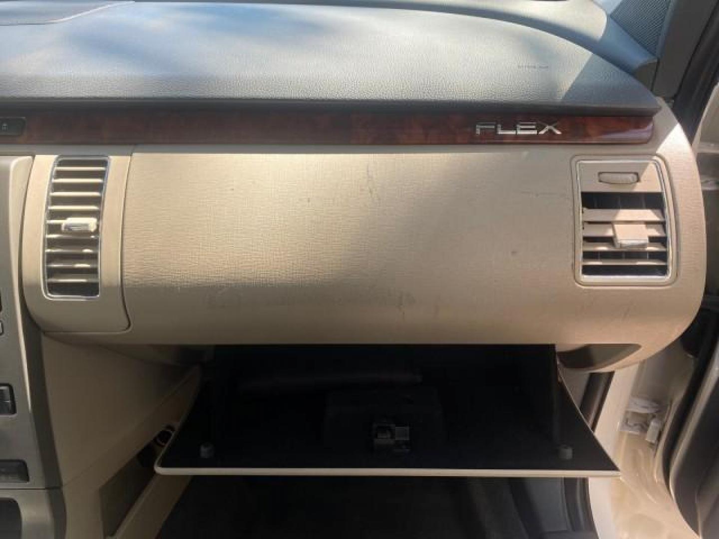 2009 White Suede /Medium Light Stone Ford Flex Limited LEATHER SUNROOF (2FMDK53C99B) with an 3.5L V6 Duratec Engine engine, Automatic transmission, located at 4701 North Dixie Hwy, Pompano Beach, FL, 33064, (954) 422-2889, 26.240938, -80.123474 - OUR WEBPAGE FLORIDACARS1.COM HAS OVER 100 PHOTOS AND FREE CARFAX LINK 2009 FORD FLEX VIN: 2FMDK53C99BA12573 4 DOOR LIMITED FWD 3.5L V6 DURATEC ENGINE GASOLINE FRONT WHEEL DRIVE Highlighted Features Bed Liner Cloth Seats ABS Brakes Automatic Transmission Power Locks AM/FM Stereo CD Audio Power Mirror - Photo#99