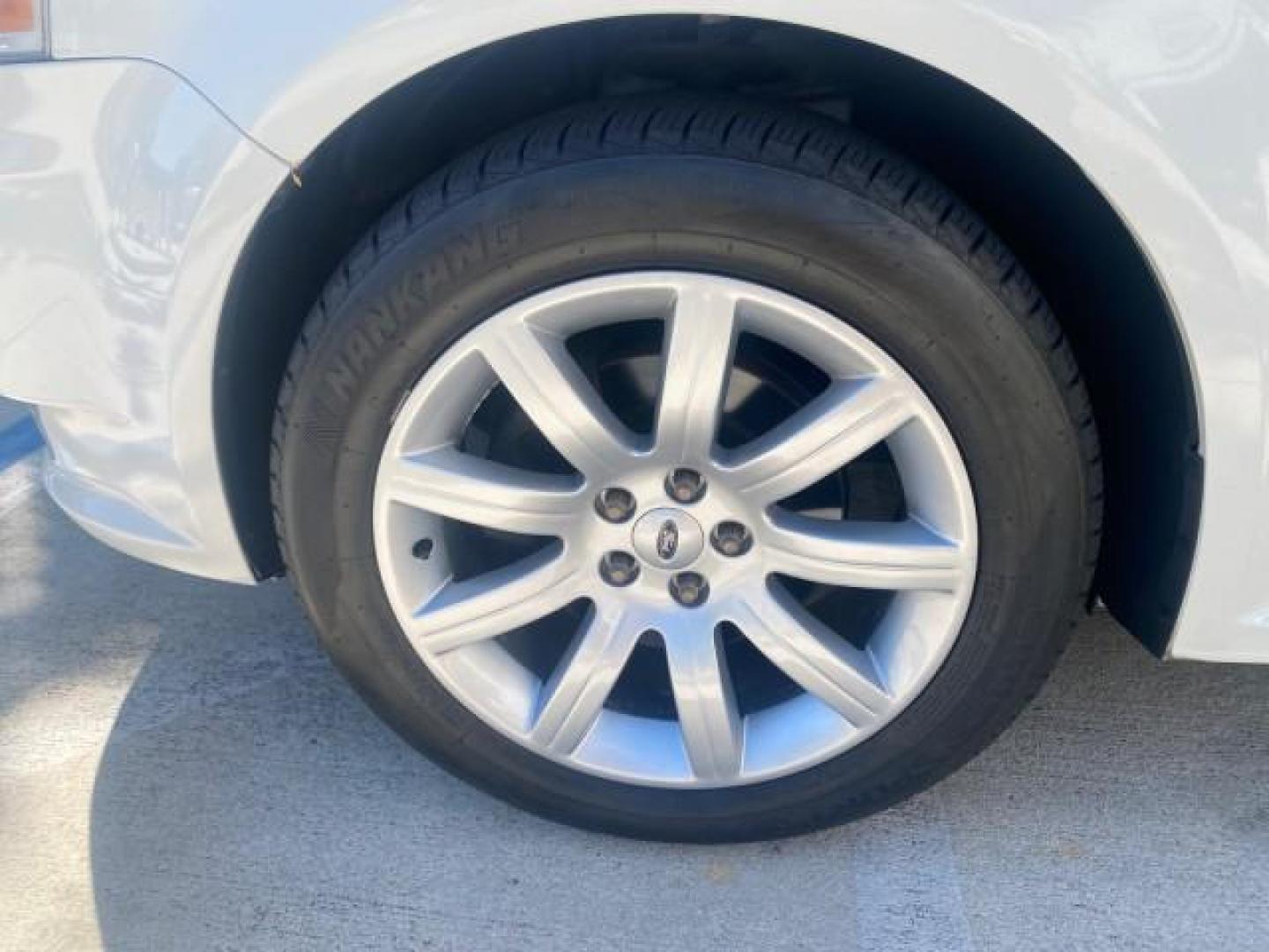 2009 White Suede /Medium Light Stone Ford Flex Limited LEATHER SUNROOF (2FMDK53C99B) with an 3.5L V6 Duratec Engine engine, Automatic transmission, located at 4701 North Dixie Hwy, Pompano Beach, FL, 33064, (954) 422-2889, 26.240938, -80.123474 - OUR WEBPAGE FLORIDACARS1.COM HAS OVER 100 PHOTOS AND FREE CARFAX LINK 2009 FORD FLEX VIN: 2FMDK53C99BA12573 4 DOOR LIMITED FWD 3.5L V6 DURATEC ENGINE GASOLINE FRONT WHEEL DRIVE Highlighted Features Bed Liner Cloth Seats ABS Brakes Automatic Transmission Power Locks AM/FM Stereo CD Audio Power Mirror - Photo#19