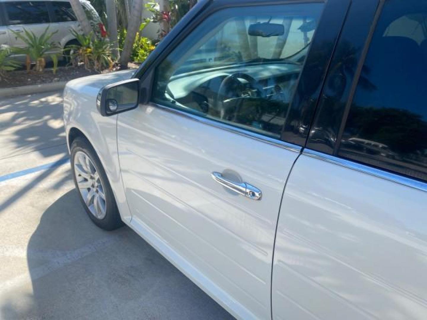 2009 White Suede /Medium Light Stone Ford Flex Limited LEATHER SUNROOF (2FMDK53C99B) with an 3.5L V6 Duratec Engine engine, Automatic transmission, located at 4701 North Dixie Hwy, Pompano Beach, FL, 33064, (954) 422-2889, 26.240938, -80.123474 - OUR WEBPAGE FLORIDACARS1.COM HAS OVER 100 PHOTOS AND FREE CARFAX LINK 2009 FORD FLEX VIN: 2FMDK53C99BA12573 4 DOOR LIMITED FWD 3.5L V6 DURATEC ENGINE GASOLINE FRONT WHEEL DRIVE Highlighted Features Bed Liner Cloth Seats ABS Brakes Automatic Transmission Power Locks AM/FM Stereo CD Audio Power Mirror - Photo#27