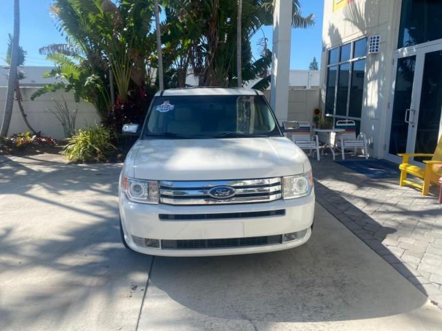 2009 White Suede /Medium Light Stone Ford Flex Limited LEATHER SUNROOF (2FMDK53C99B) with an 3.5L V6 Duratec Engine engine, Automatic transmission, located at 4701 North Dixie Hwy, Pompano Beach, FL, 33064, (954) 422-2889, 26.240938, -80.123474 - OUR WEBPAGE FLORIDACARS1.COM HAS OVER 100 PHOTOS AND FREE CARFAX LINK 2009 FORD FLEX VIN: 2FMDK53C99BA12573 4 DOOR LIMITED FWD 3.5L V6 DURATEC ENGINE GASOLINE FRONT WHEEL DRIVE Highlighted Features Bed Liner Cloth Seats ABS Brakes Automatic Transmission Power Locks AM/FM Stereo CD Audio Power Mirror - Photo#2