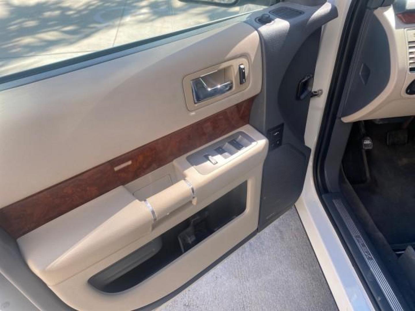 2009 White Suede /Medium Light Stone Ford Flex Limited LEATHER SUNROOF (2FMDK53C99B) with an 3.5L V6 Duratec Engine engine, Automatic transmission, located at 4701 North Dixie Hwy, Pompano Beach, FL, 33064, (954) 422-2889, 26.240938, -80.123474 - OUR WEBPAGE FLORIDACARS1.COM HAS OVER 100 PHOTOS AND FREE CARFAX LINK 2009 FORD FLEX VIN: 2FMDK53C99BA12573 4 DOOR LIMITED FWD 3.5L V6 DURATEC ENGINE GASOLINE FRONT WHEEL DRIVE Highlighted Features Bed Liner Cloth Seats ABS Brakes Automatic Transmission Power Locks AM/FM Stereo CD Audio Power Mirror - Photo#29