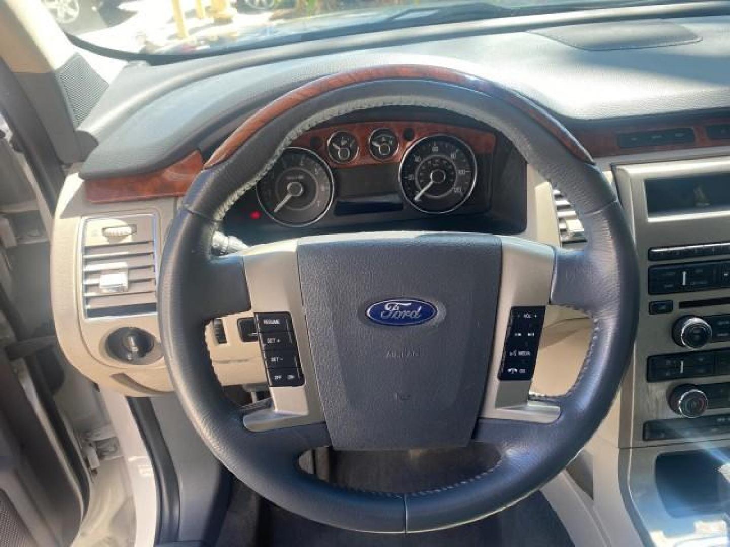 2009 White Suede /Medium Light Stone Ford Flex Limited LEATHER SUNROOF (2FMDK53C99B) with an 3.5L V6 Duratec Engine engine, Automatic transmission, located at 4701 North Dixie Hwy, Pompano Beach, FL, 33064, (954) 422-2889, 26.240938, -80.123474 - OUR WEBPAGE FLORIDACARS1.COM HAS OVER 100 PHOTOS AND FREE CARFAX LINK 2009 FORD FLEX VIN: 2FMDK53C99BA12573 4 DOOR LIMITED FWD 3.5L V6 DURATEC ENGINE GASOLINE FRONT WHEEL DRIVE Highlighted Features Bed Liner Cloth Seats ABS Brakes Automatic Transmission Power Locks AM/FM Stereo CD Audio Power Mirror - Photo#34