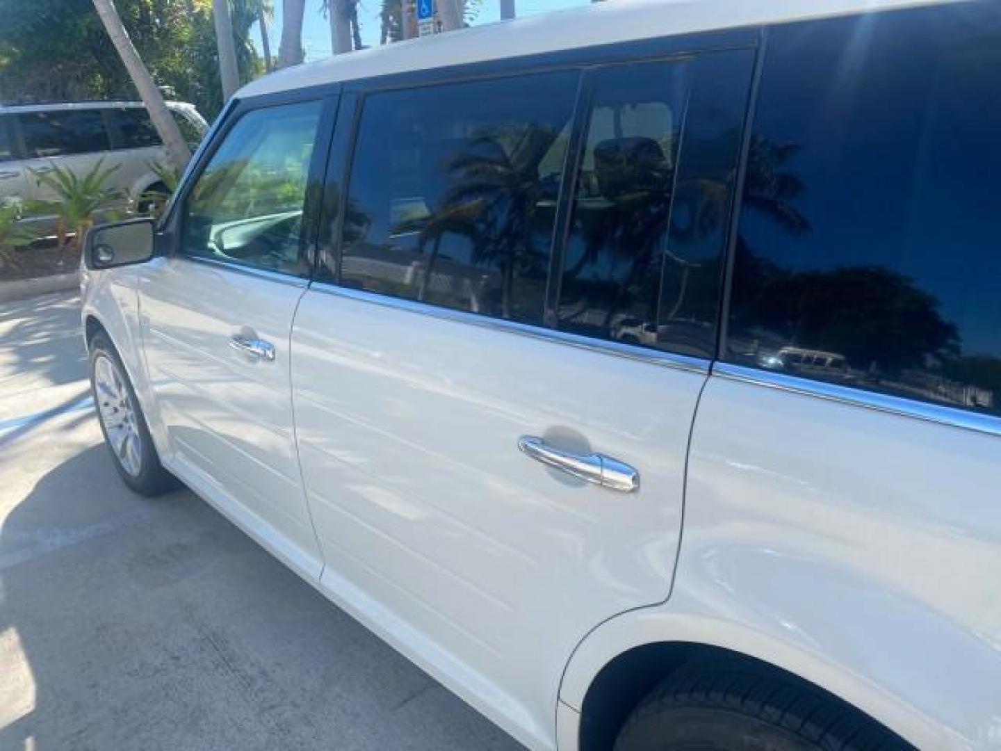 2009 White Suede /Medium Light Stone Ford Flex Limited LEATHER SUNROOF (2FMDK53C99B) with an 3.5L V6 Duratec Engine engine, Automatic transmission, located at 4701 North Dixie Hwy, Pompano Beach, FL, 33064, (954) 422-2889, 26.240938, -80.123474 - OUR WEBPAGE FLORIDACARS1.COM HAS OVER 100 PHOTOS AND FREE CARFAX LINK 2009 FORD FLEX VIN: 2FMDK53C99BA12573 4 DOOR LIMITED FWD 3.5L V6 DURATEC ENGINE GASOLINE FRONT WHEEL DRIVE Highlighted Features Bed Liner Cloth Seats ABS Brakes Automatic Transmission Power Locks AM/FM Stereo CD Audio Power Mirror - Photo#56