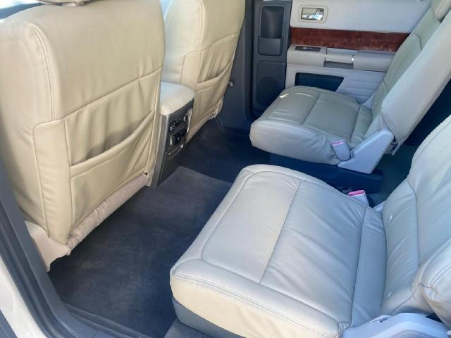 2009 White Suede /Medium Light Stone Ford Flex Limited LEATHER SUNROOF (2FMDK53C99B) with an 3.5L V6 Duratec Engine engine, Automatic transmission, located at 4701 North Dixie Hwy, Pompano Beach, FL, 33064, (954) 422-2889, 26.240938, -80.123474 - OUR WEBPAGE FLORIDACARS1.COM HAS OVER 100 PHOTOS AND FREE CARFAX LINK 2009 FORD FLEX VIN: 2FMDK53C99BA12573 4 DOOR LIMITED FWD 3.5L V6 DURATEC ENGINE GASOLINE FRONT WHEEL DRIVE Highlighted Features Bed Liner Cloth Seats ABS Brakes Automatic Transmission Power Locks AM/FM Stereo CD Audio Power Mirror - Photo#59