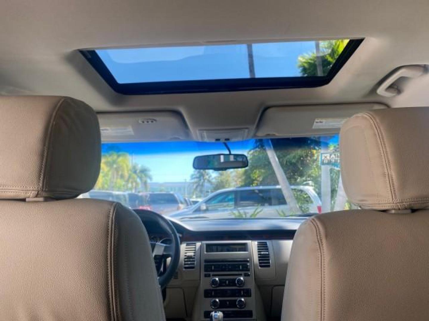 2009 White Suede /Medium Light Stone Ford Flex Limited LEATHER SUNROOF (2FMDK53C99B) with an 3.5L V6 Duratec Engine engine, Automatic transmission, located at 4701 North Dixie Hwy, Pompano Beach, FL, 33064, (954) 422-2889, 26.240938, -80.123474 - OUR WEBPAGE FLORIDACARS1.COM HAS OVER 100 PHOTOS AND FREE CARFAX LINK 2009 FORD FLEX VIN: 2FMDK53C99BA12573 4 DOOR LIMITED FWD 3.5L V6 DURATEC ENGINE GASOLINE FRONT WHEEL DRIVE Highlighted Features Bed Liner Cloth Seats ABS Brakes Automatic Transmission Power Locks AM/FM Stereo CD Audio Power Mirror - Photo#62