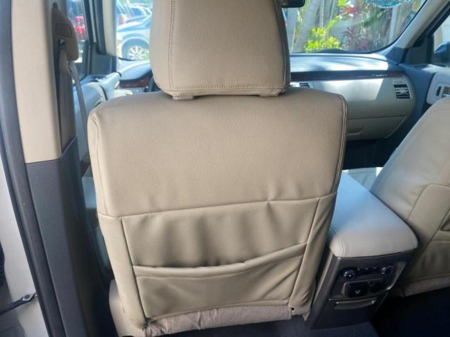 2009 White Suede /Medium Light Stone Ford Flex Limited LEATHER SUNROOF (2FMDK53C99B) with an 3.5L V6 Duratec Engine engine, Automatic transmission, located at 4701 North Dixie Hwy, Pompano Beach, FL, 33064, (954) 422-2889, 26.240938, -80.123474 - OUR WEBPAGE FLORIDACARS1.COM HAS OVER 100 PHOTOS AND FREE CARFAX LINK 2009 FORD FLEX VIN: 2FMDK53C99BA12573 4 DOOR LIMITED FWD 3.5L V6 DURATEC ENGINE GASOLINE FRONT WHEEL DRIVE Highlighted Features Bed Liner Cloth Seats ABS Brakes Automatic Transmission Power Locks AM/FM Stereo CD Audio Power Mirror - Photo#63