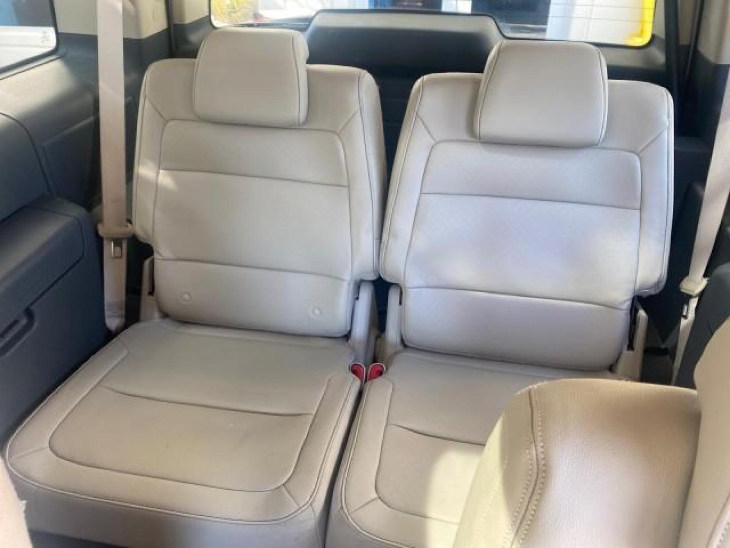 2009 White Suede /Medium Light Stone Ford Flex Limited LEATHER SUNROOF (2FMDK53C99B) with an 3.5L V6 Duratec Engine engine, Automatic transmission, located at 4701 North Dixie Hwy, Pompano Beach, FL, 33064, (954) 422-2889, 26.240938, -80.123474 - OUR WEBPAGE FLORIDACARS1.COM HAS OVER 100 PHOTOS AND FREE CARFAX LINK 2009 FORD FLEX VIN: 2FMDK53C99BA12573 4 DOOR LIMITED FWD 3.5L V6 DURATEC ENGINE GASOLINE FRONT WHEEL DRIVE Highlighted Features Bed Liner Cloth Seats ABS Brakes Automatic Transmission Power Locks AM/FM Stereo CD Audio Power Mirror - Photo#64